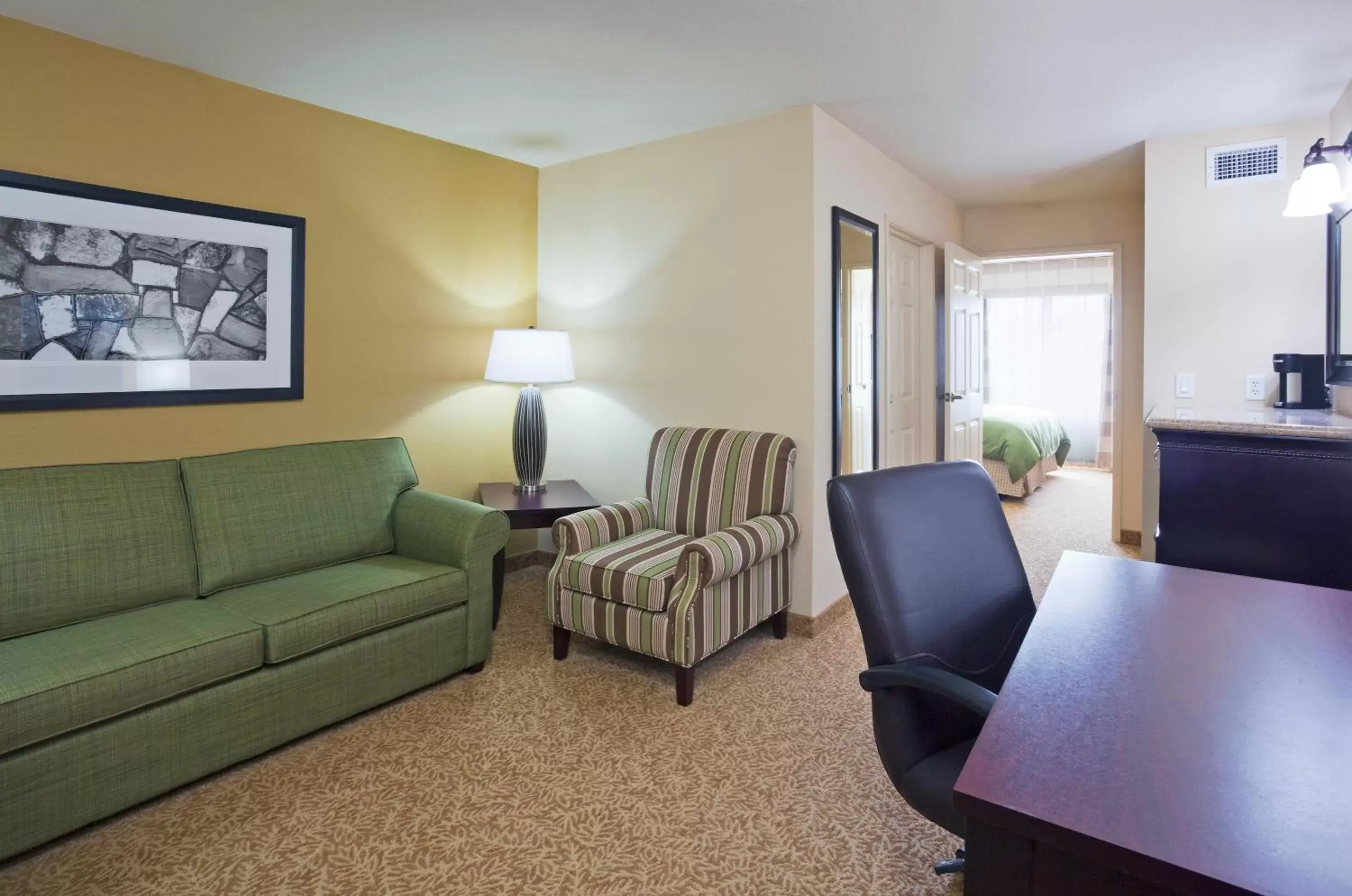 Bedroom, Seating Area in Country Inn & Suites by Radisson, Minot, ND