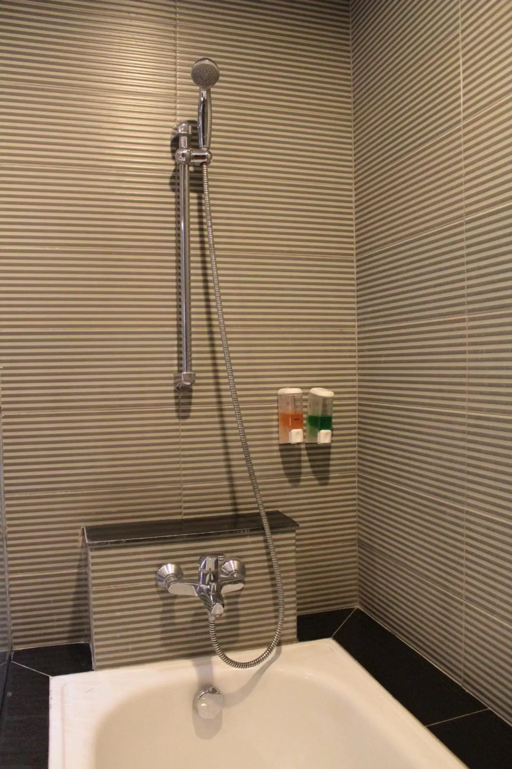 Shower, Bathroom in 100 Sunset Kuta Hotel & Ballroom