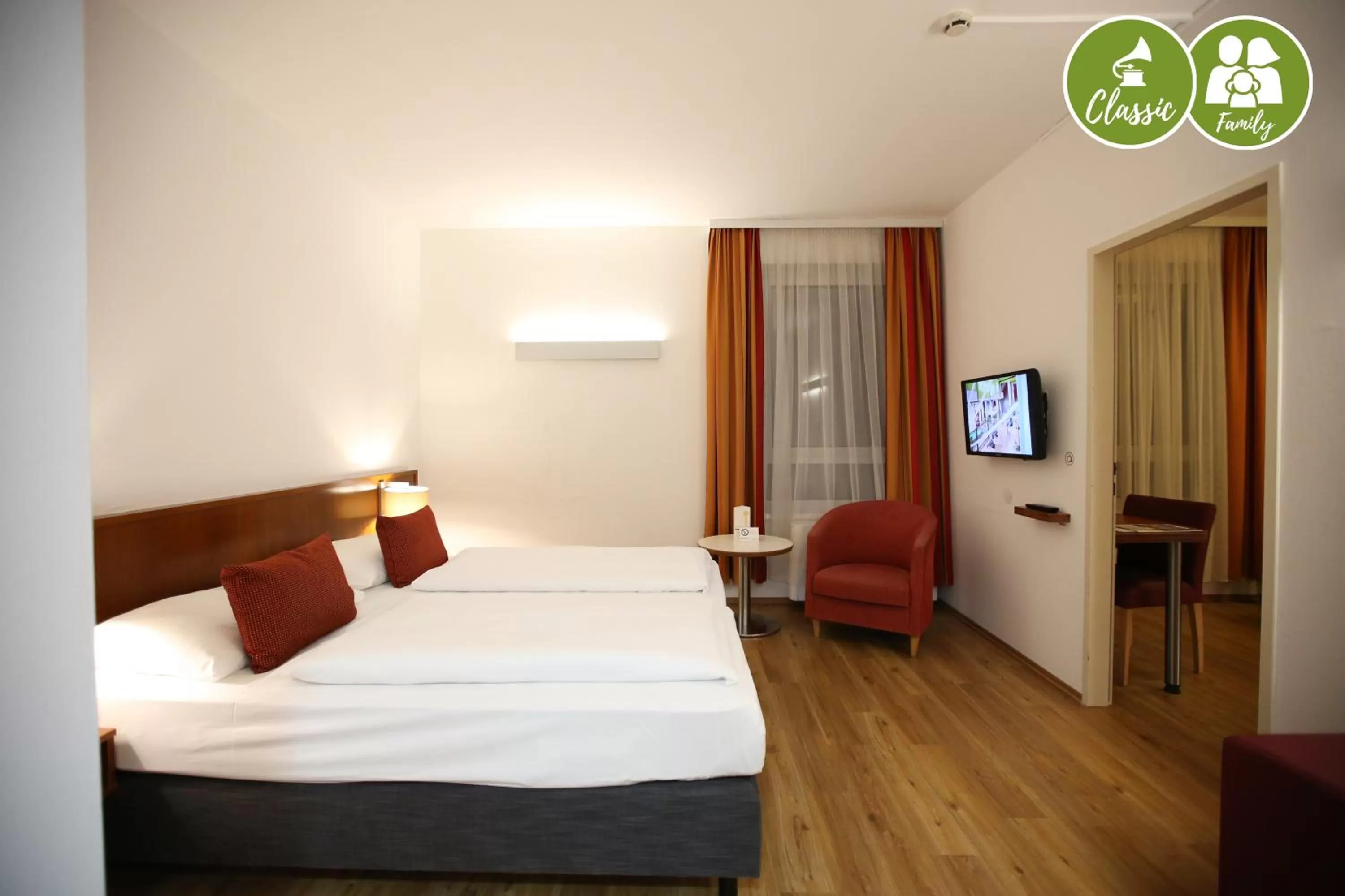 Seating area, Bed in arte Hotel Wien Stadthalle