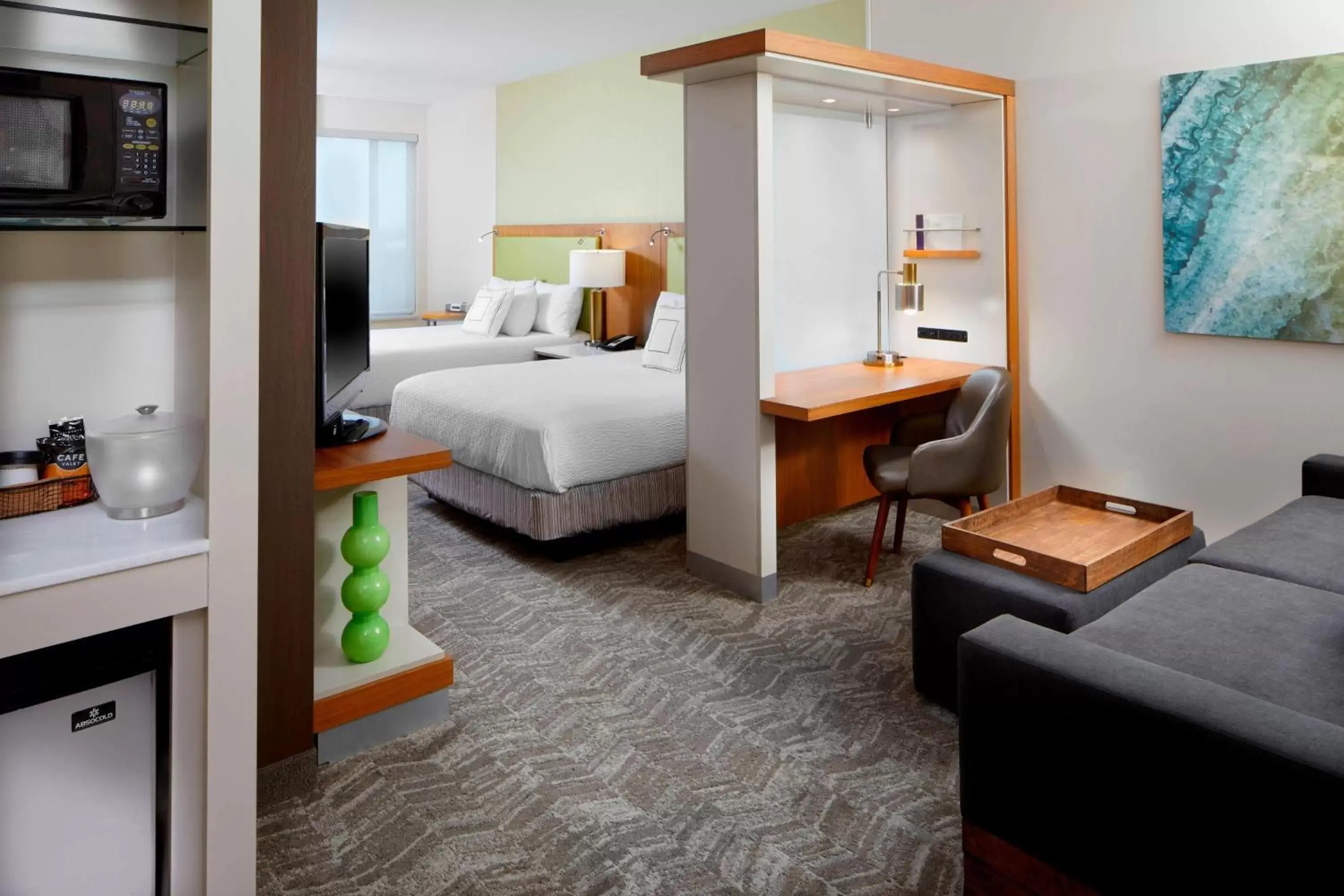 Living room, Bed in SpringHill Suites by Marriott Pittsburgh Bakery Square