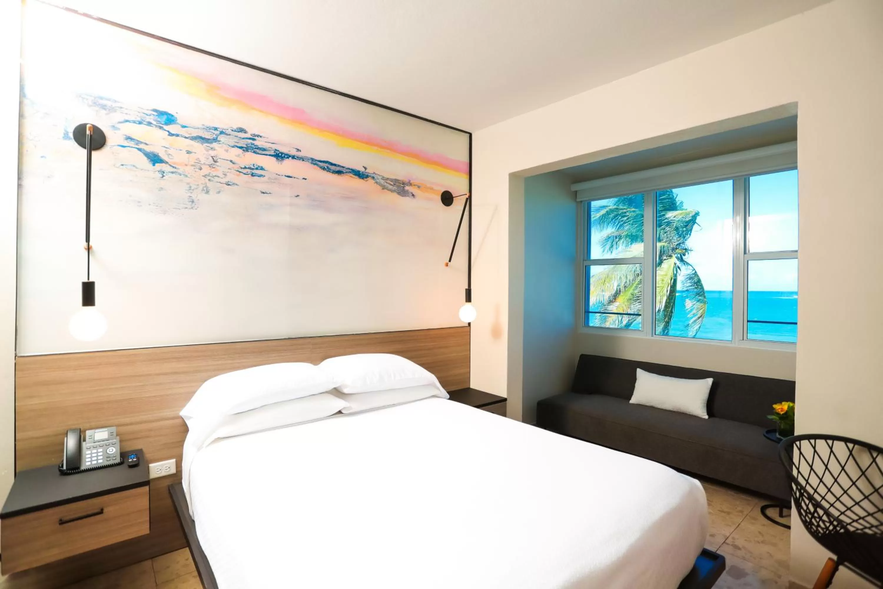 Photo of the whole room, Bed in The Tryst Beachfront Hotel