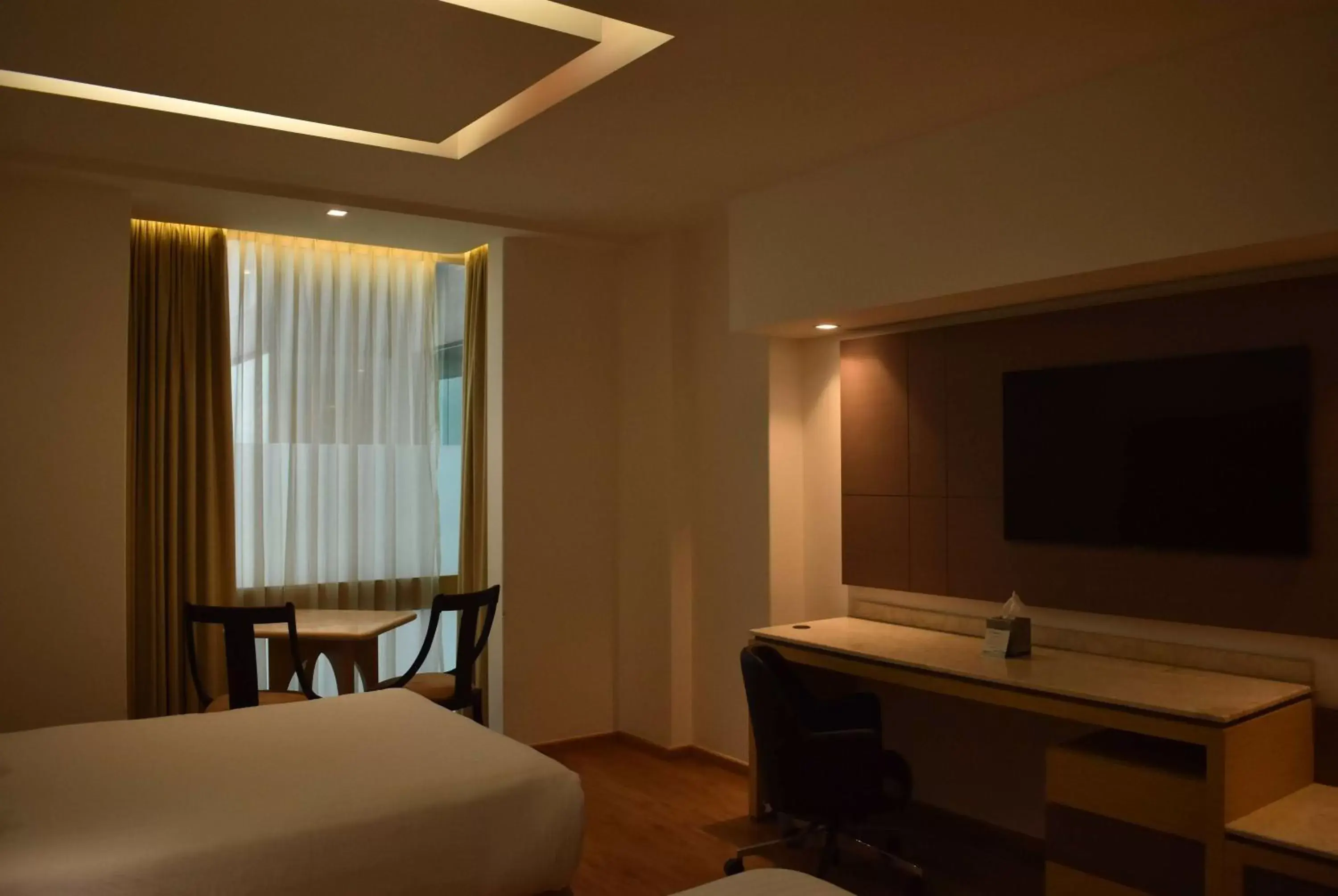 Photo of the whole room, TV/Entertainment Center in Ramada by Wyndham Mexico City Santa Fe