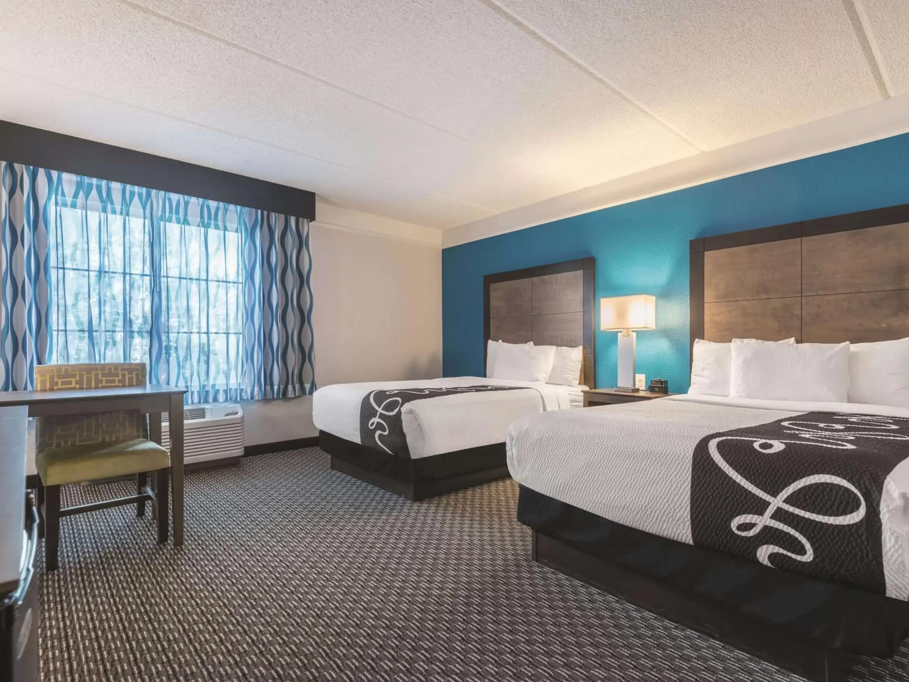 Photo of the whole room, Bed in La Quinta by Wyndham Orlando Lake Mary Photo of the whole room, Bed in La Quinta by Wyndham Orlando Lake Mary