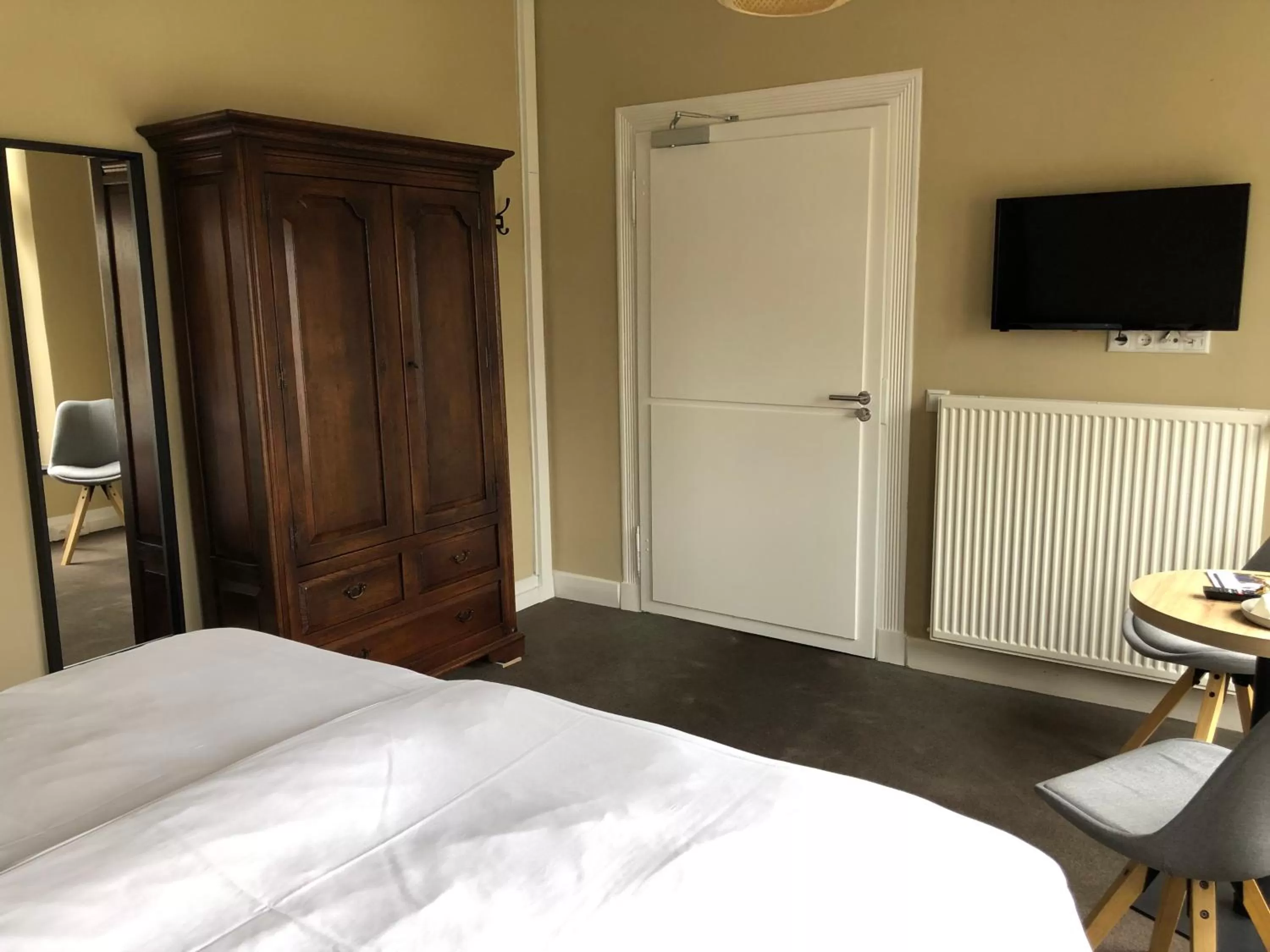 Bed in De Pastorie Bed & Breakfast