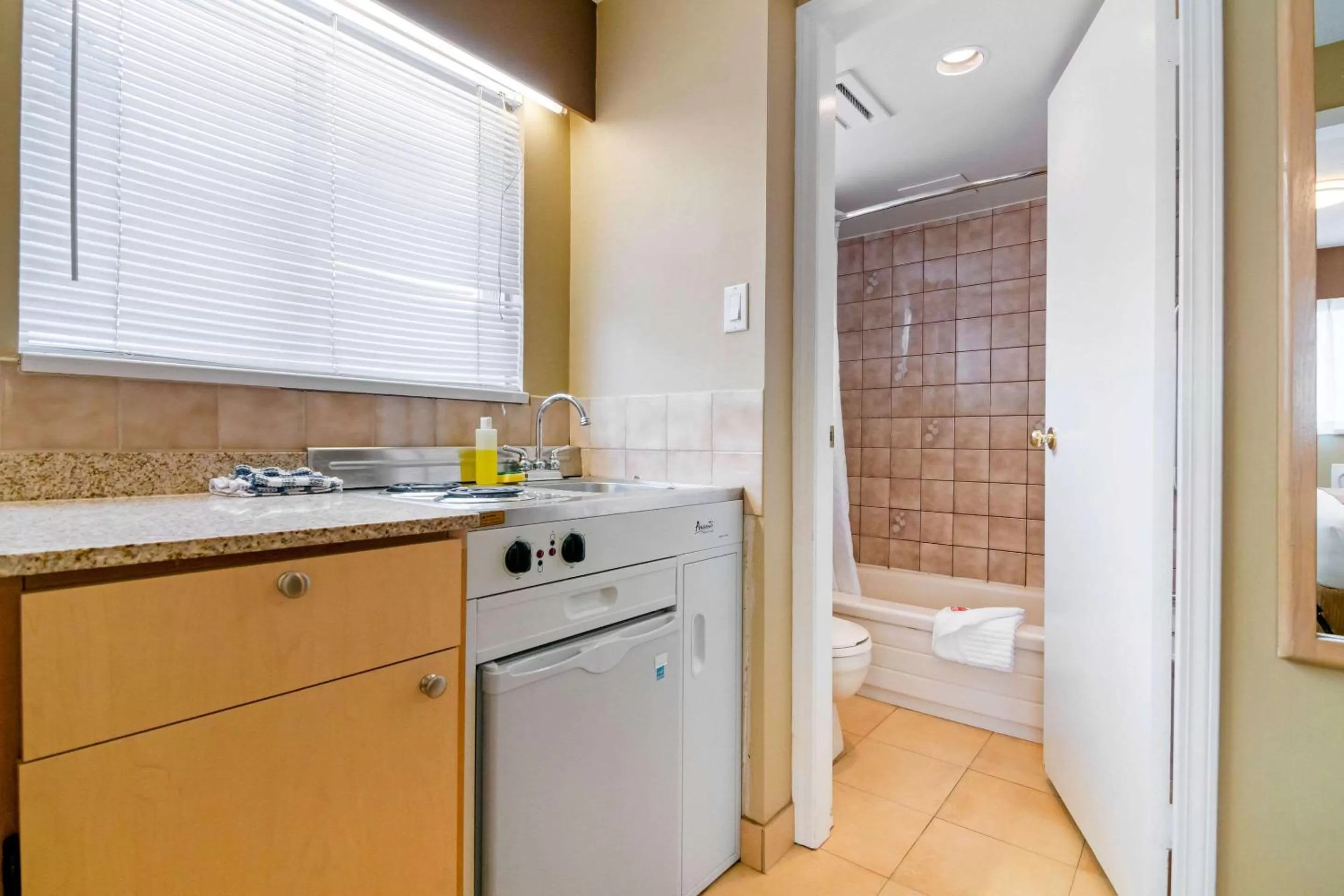 Bedroom in Econo Lodge Inn & Suites