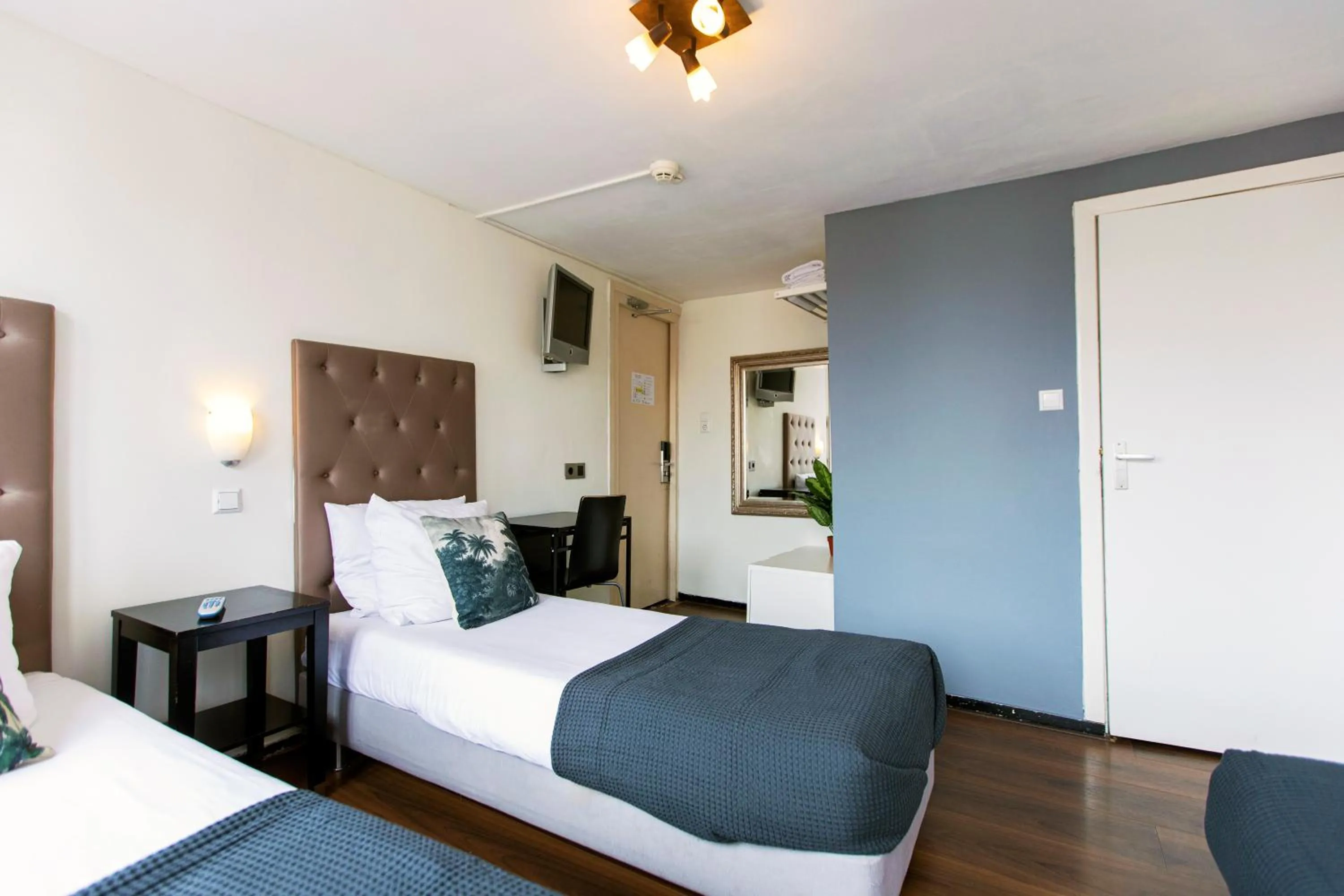 Bed in Quentin Arrive Hotel