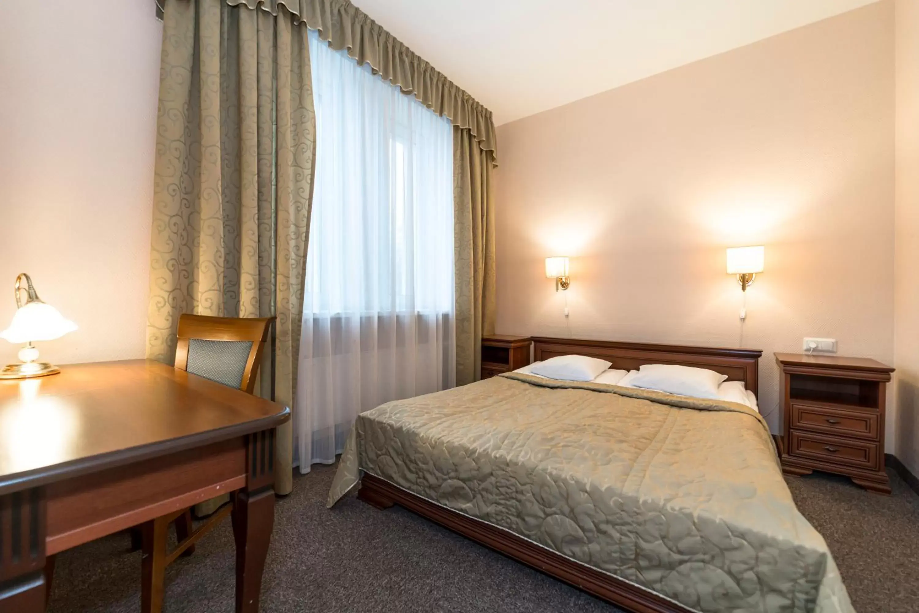 Bed in Kolonna Hotel Brigita