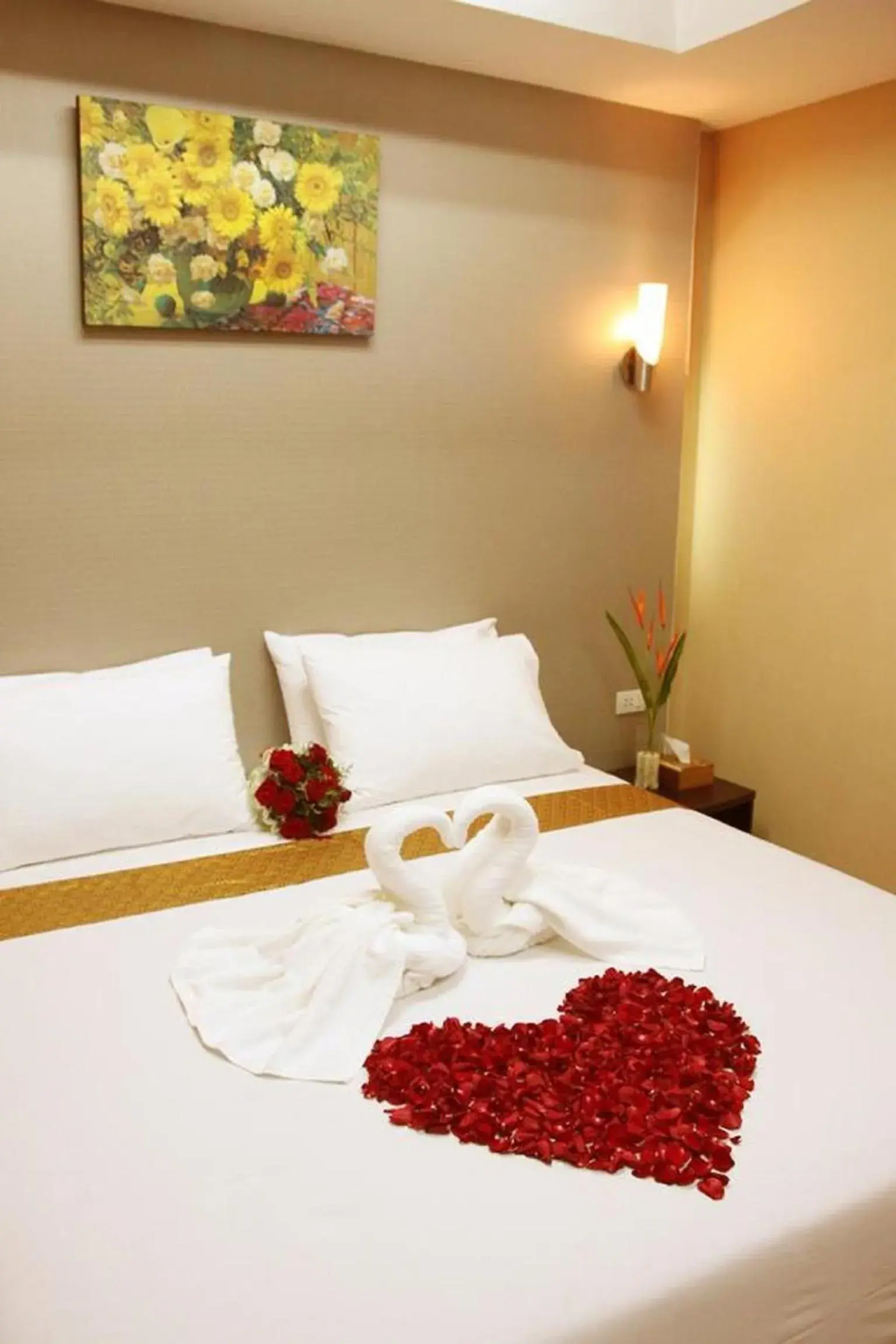 Bed in Visiting Card Hotel & Resort