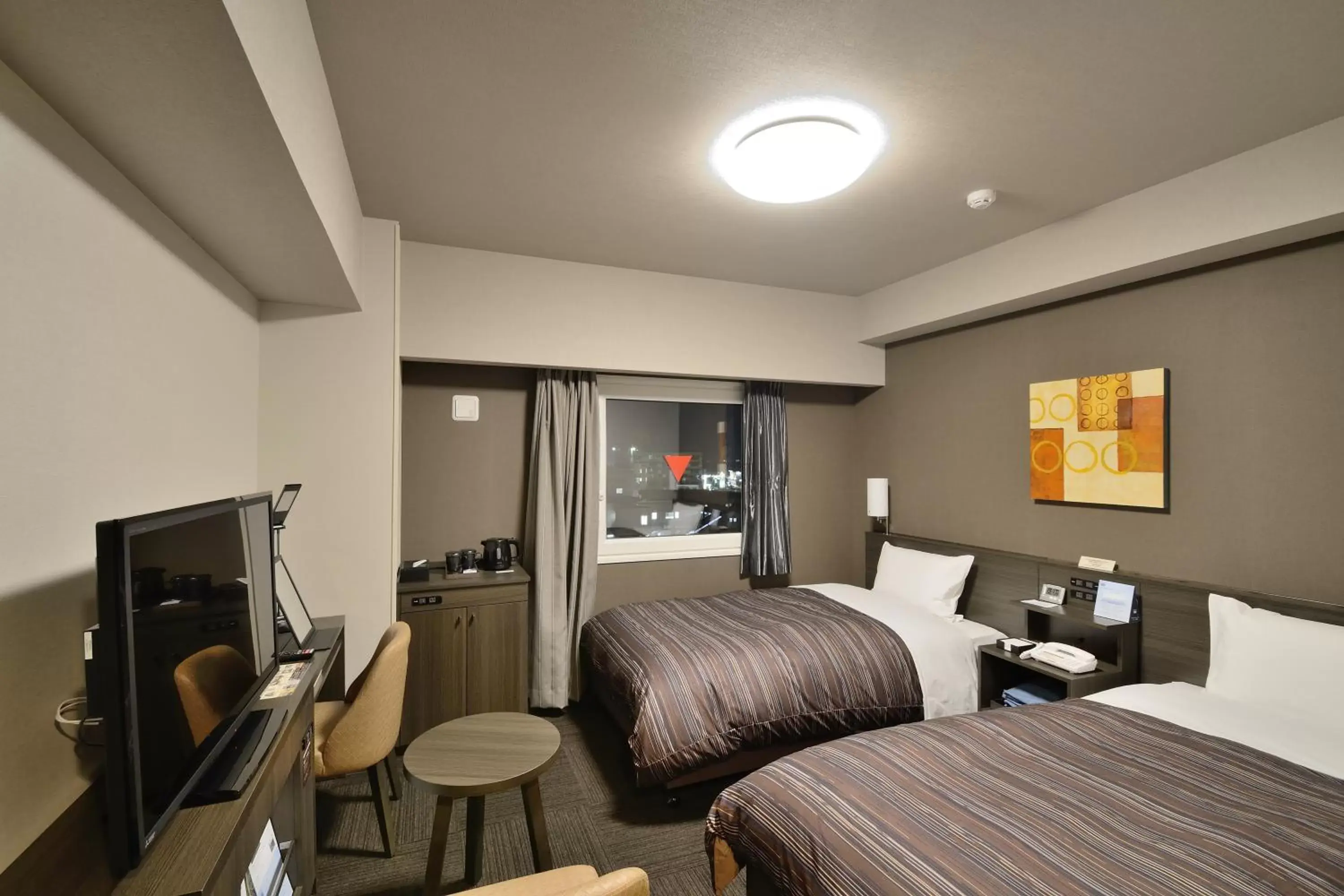 Bed in Hotel Route-Inn Yanagawa Ekimae