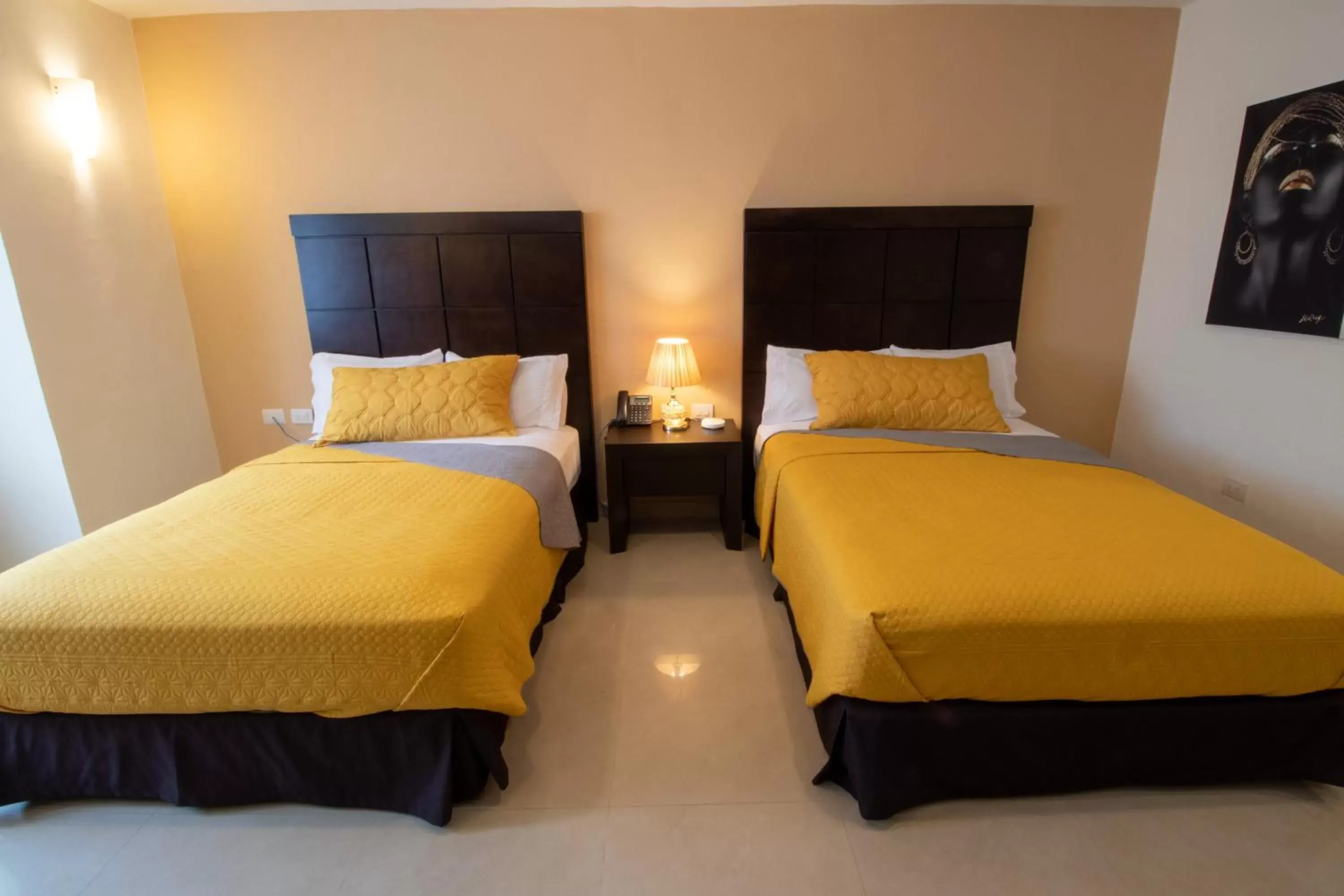 Bed in Hotel Villas Segovia Suites Playa del Carmen