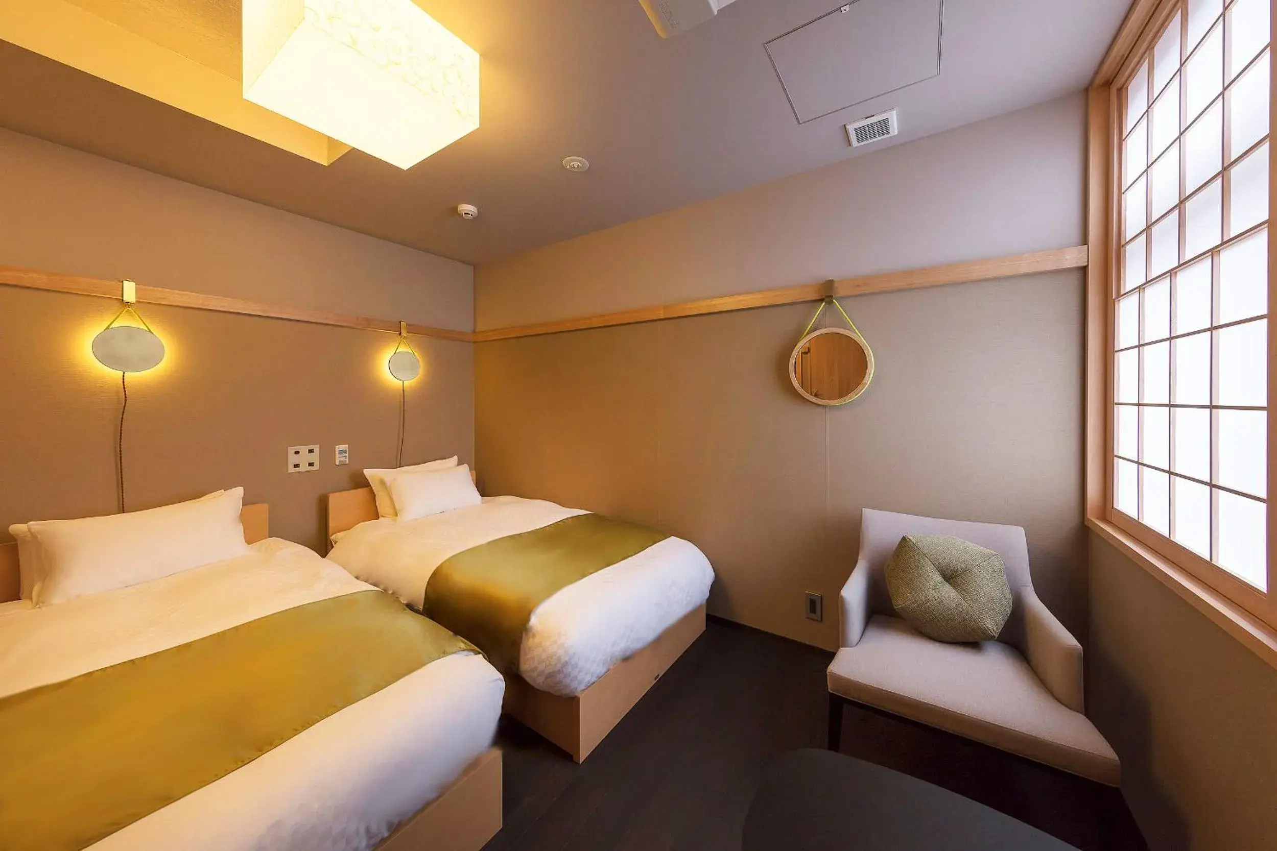 Bed in Gozan Hotel & Serviced Apartment Higashiyama Sanjo