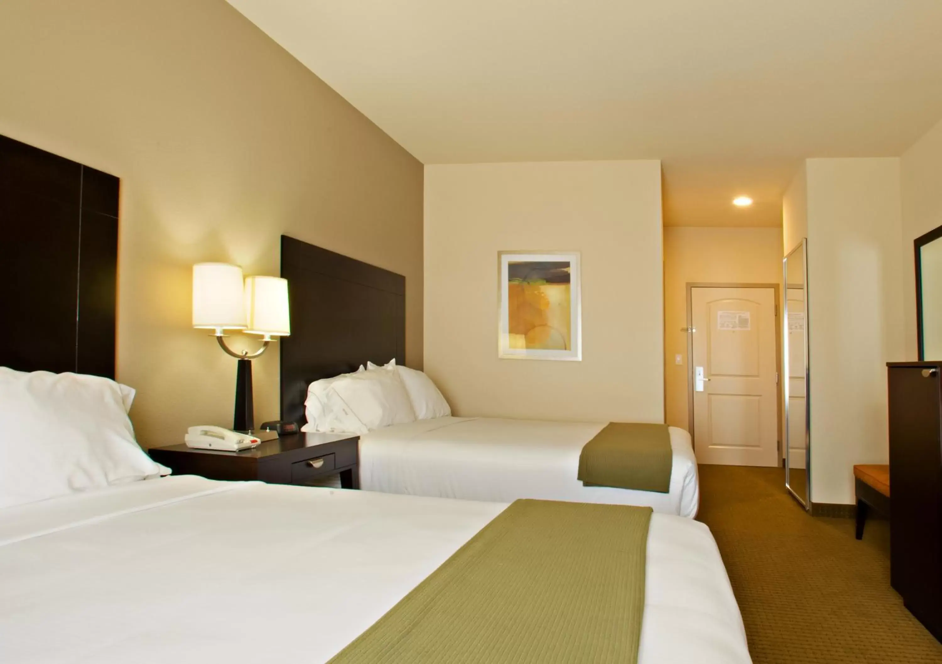 Bed in Holiday Inn Express Hotel & Suites Shamrock North, an IHG Hotel