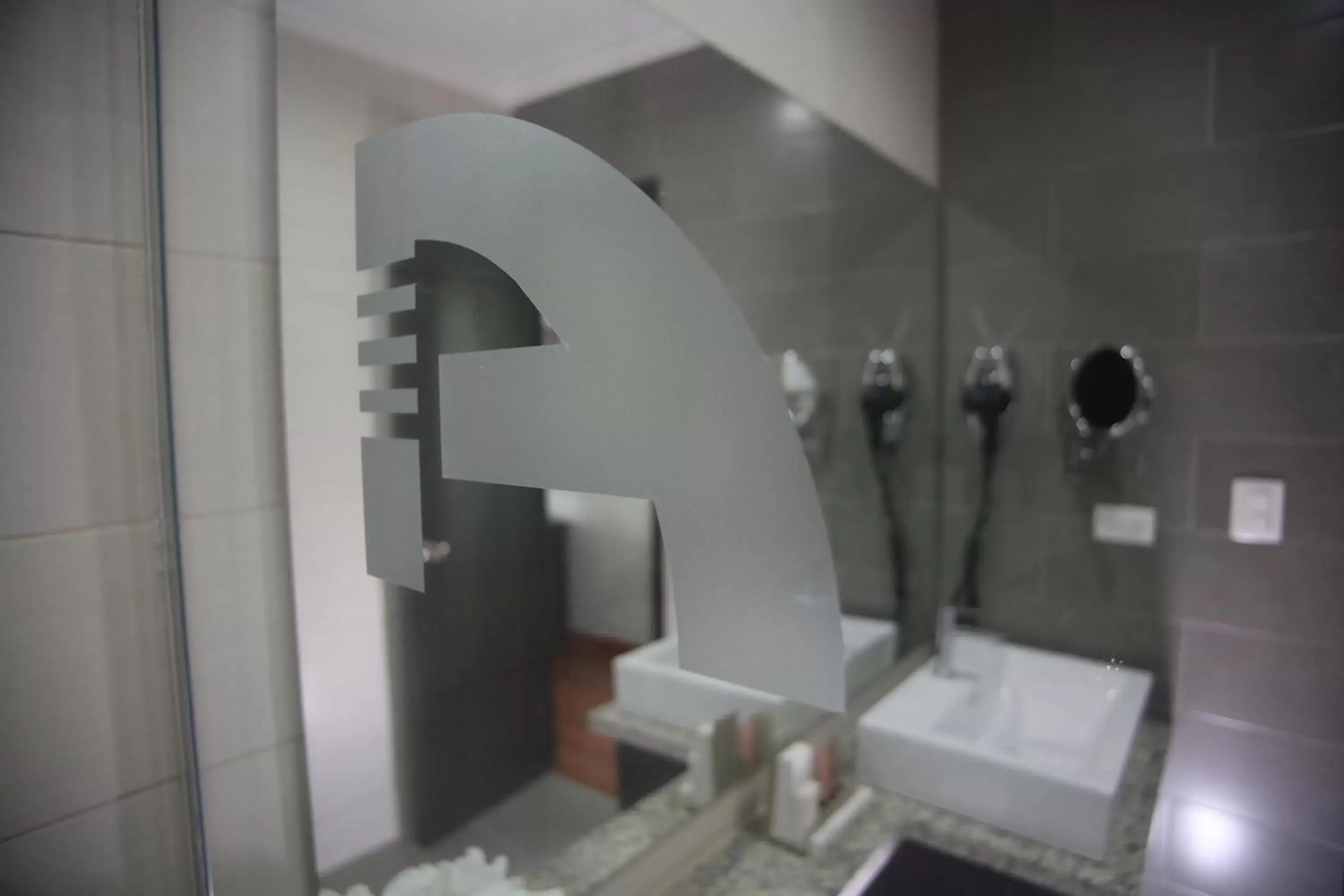 Bathroom in Aranjuez Hotel & Suites
