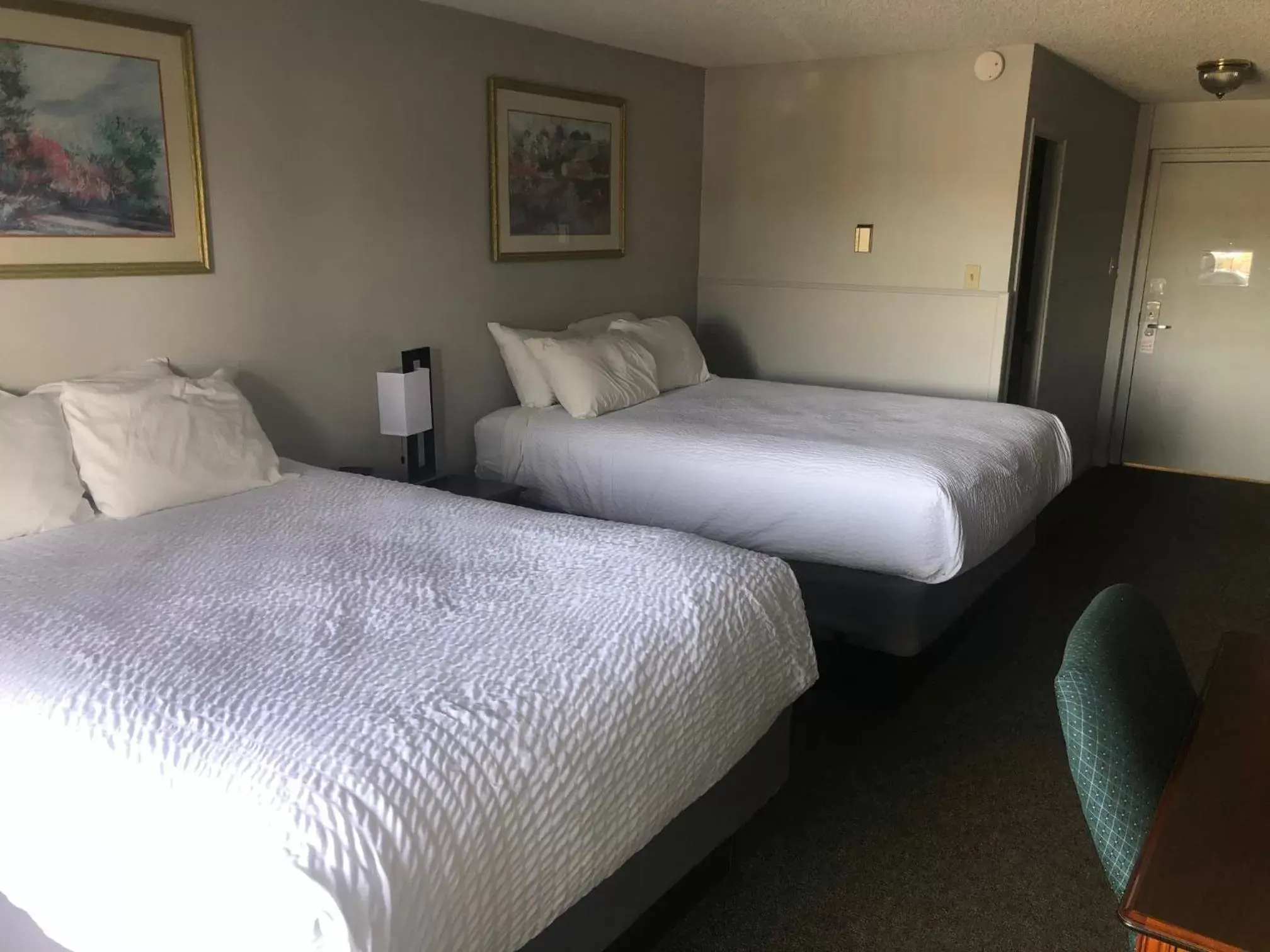 Bed in Satellite Hotel