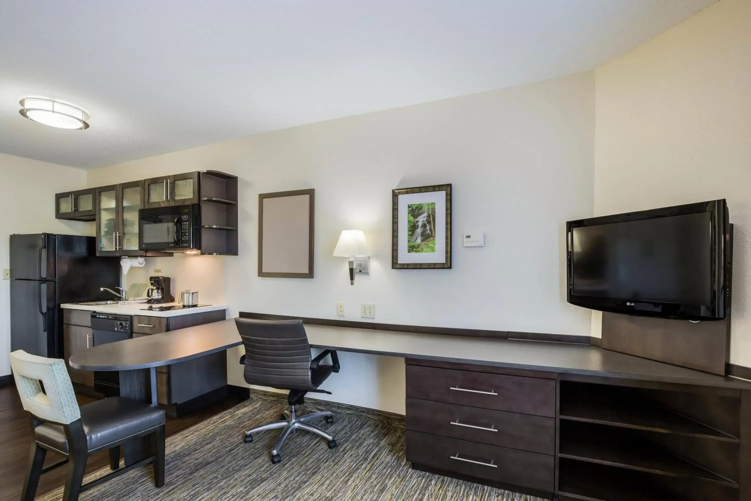 Photo of the whole room, TV/Entertainment Center in Candlewood Suites Virginia Beach Town Center, an IHG Hotel