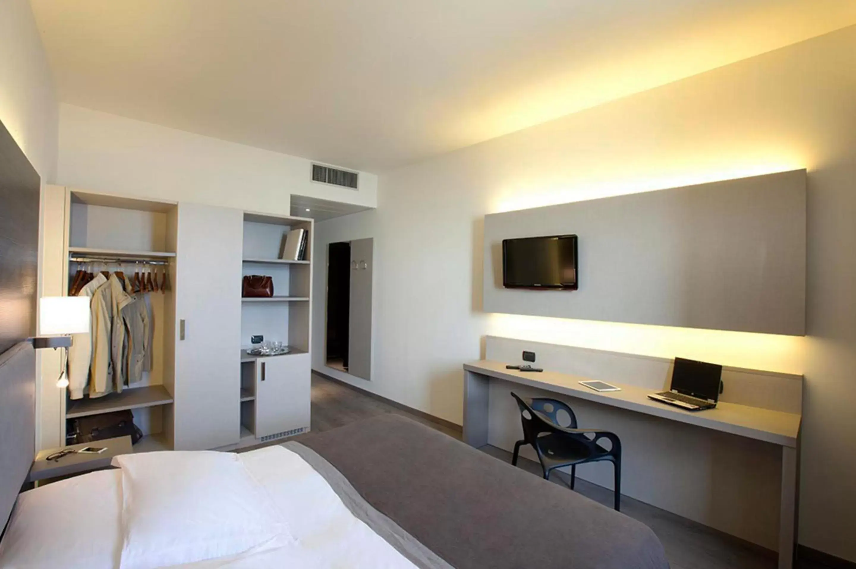 Photo of the whole room, TV/Entertainment Center in Hotel Giardino
