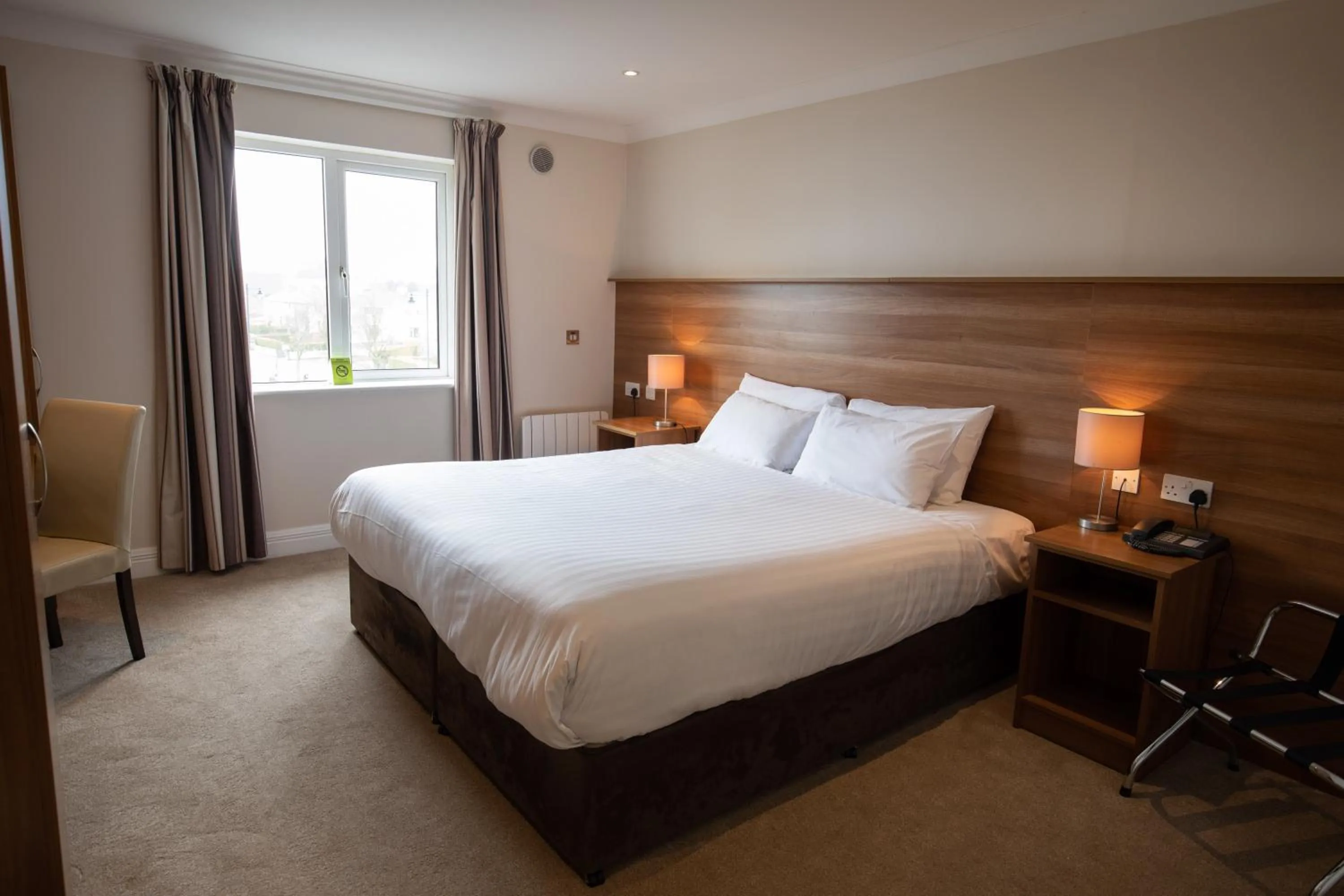 Bed in Riverside Hotel