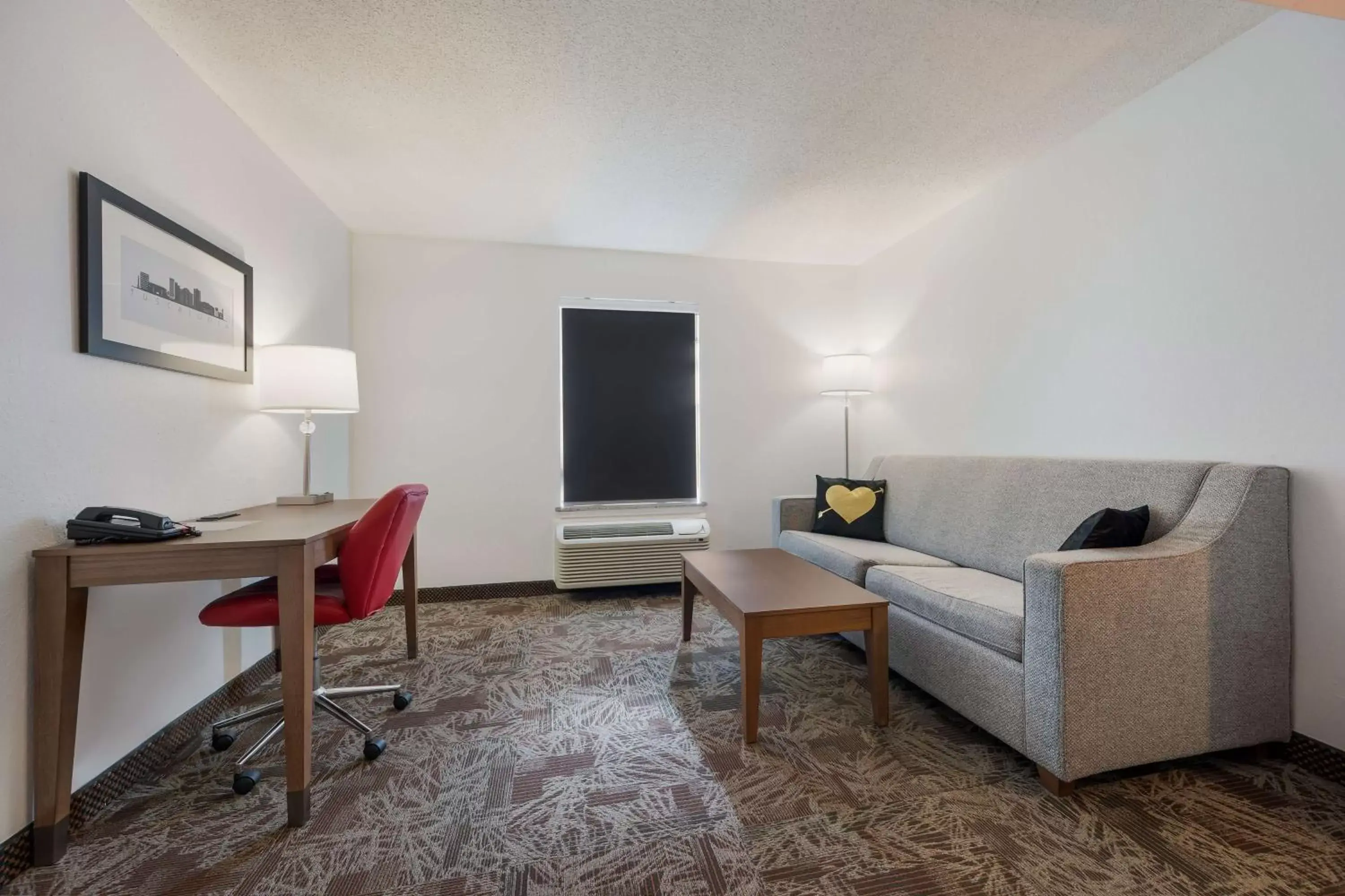 Bedroom, Seating Area in SureStay Hotel By Best Western Tuscaloosa Southeast