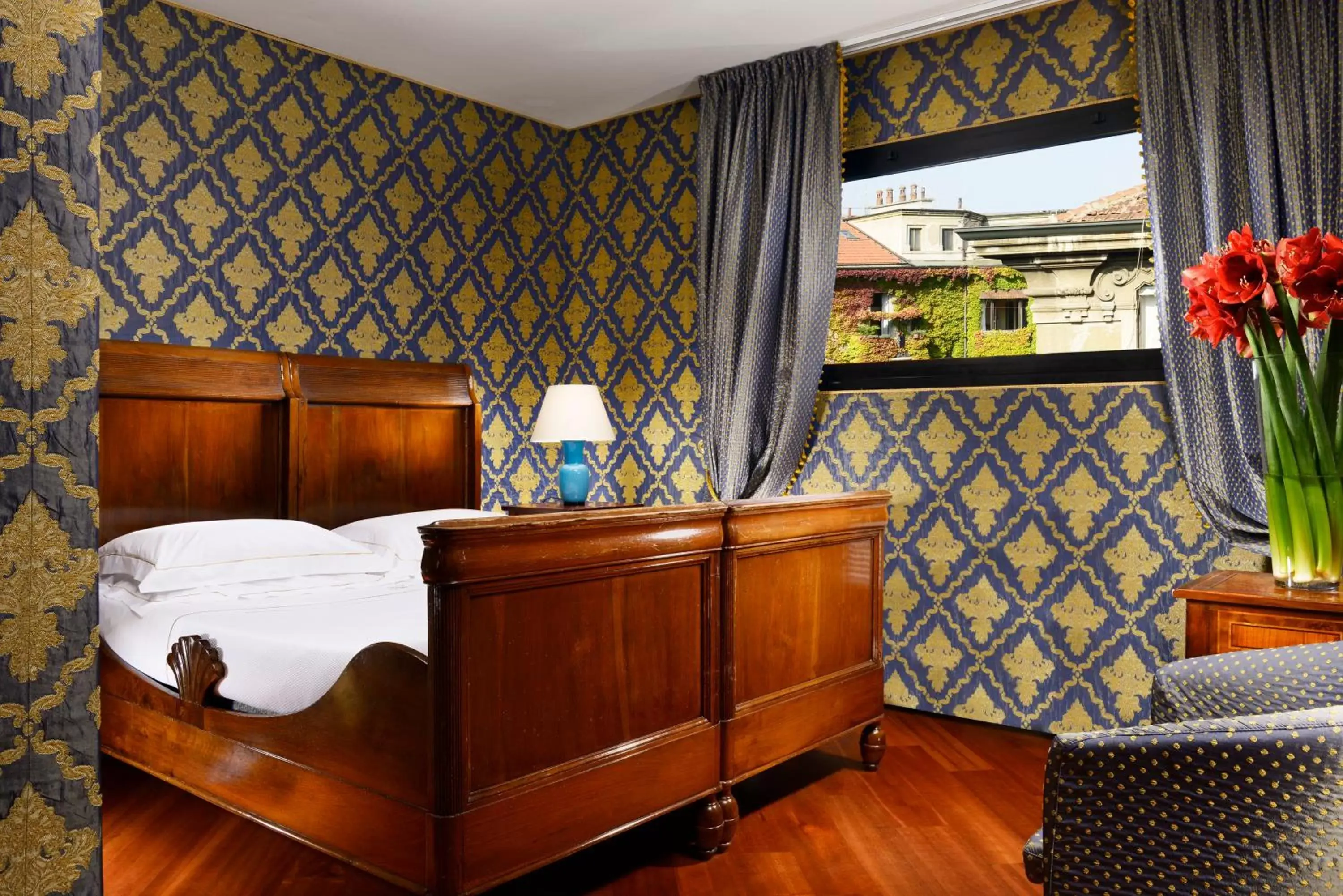 Bed in Hotel Pierre Milano