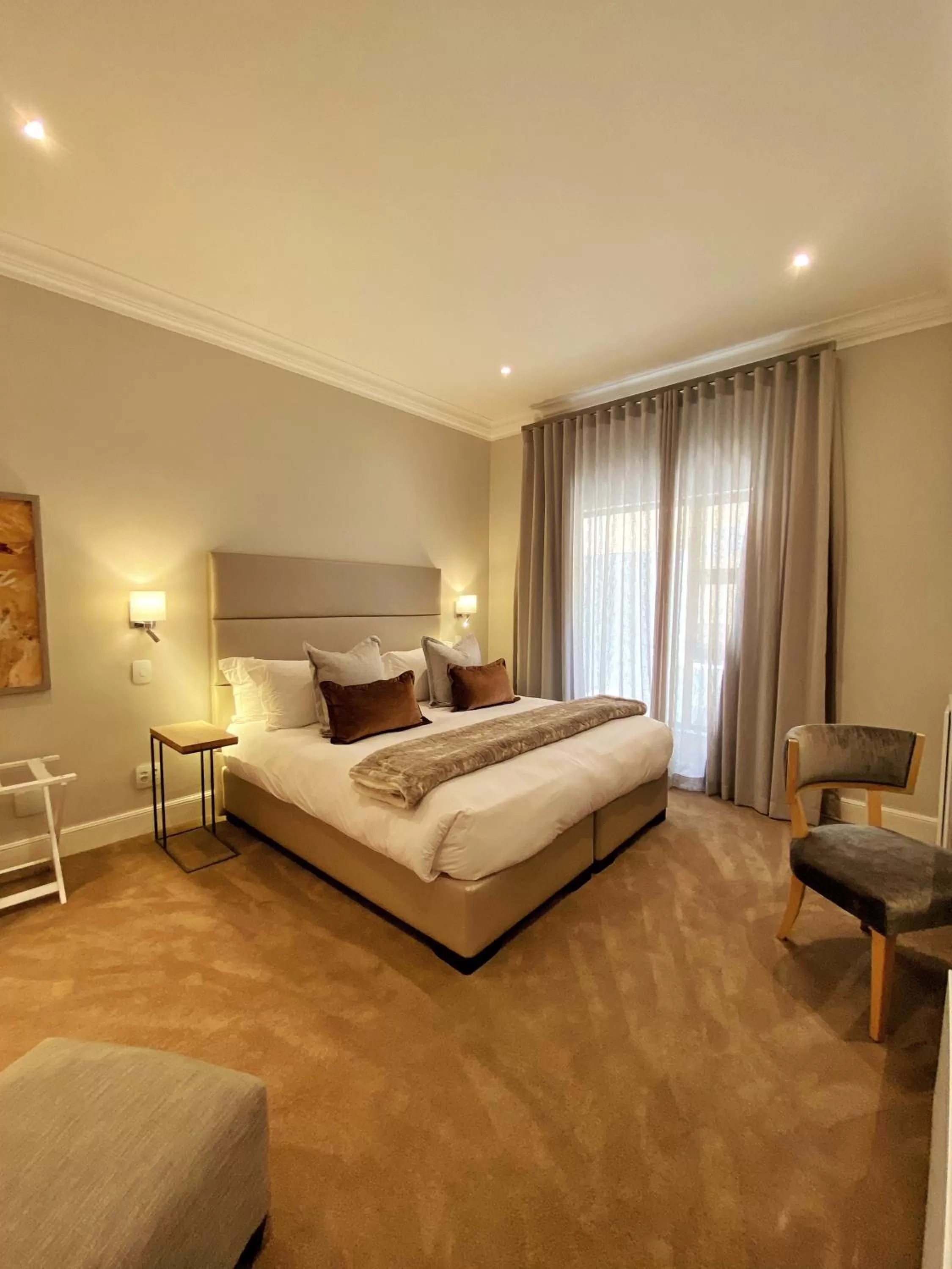 Bed in The Northcliff Boutique Hotel