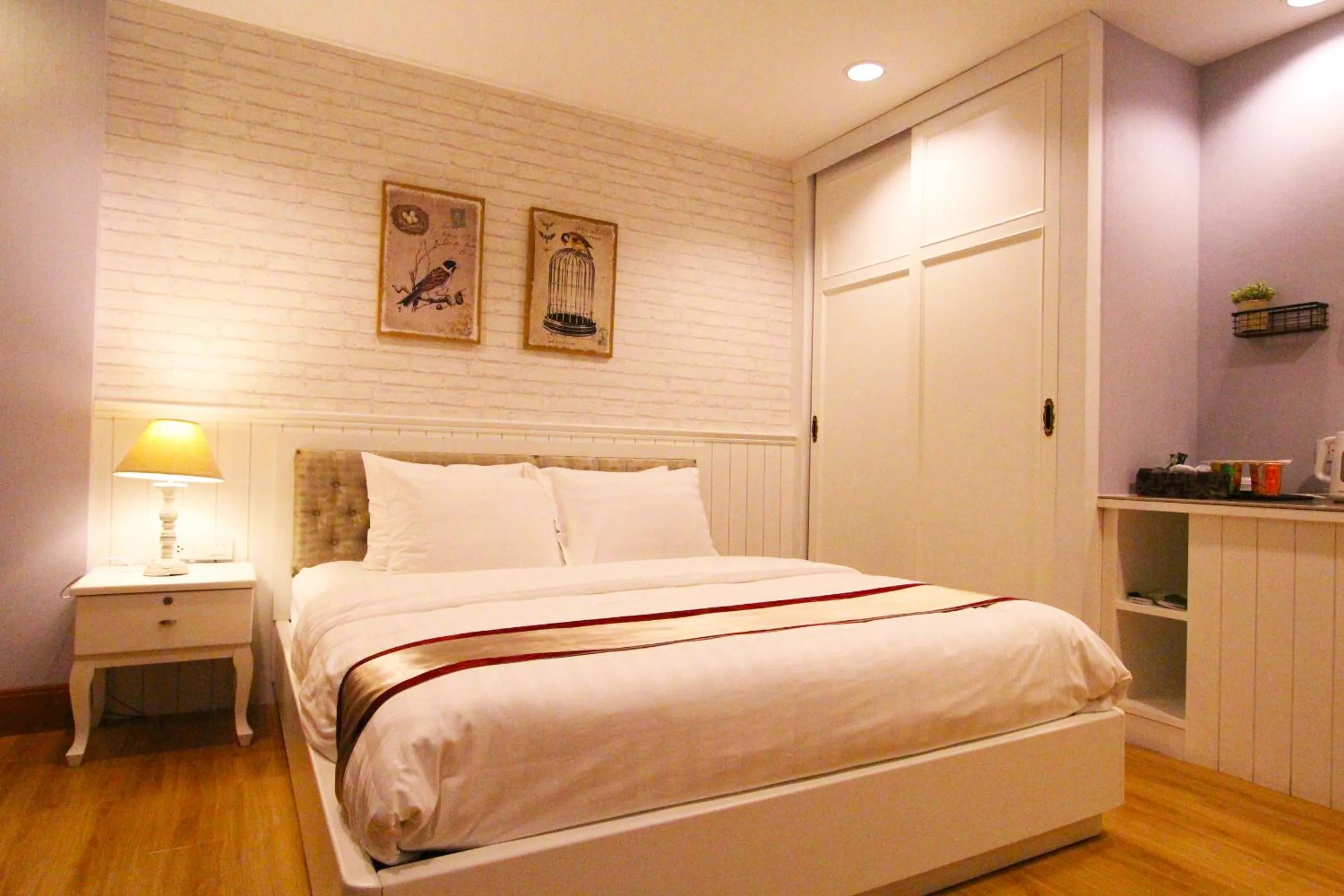 Bed in At Residence Suvarnabhumi Hotel