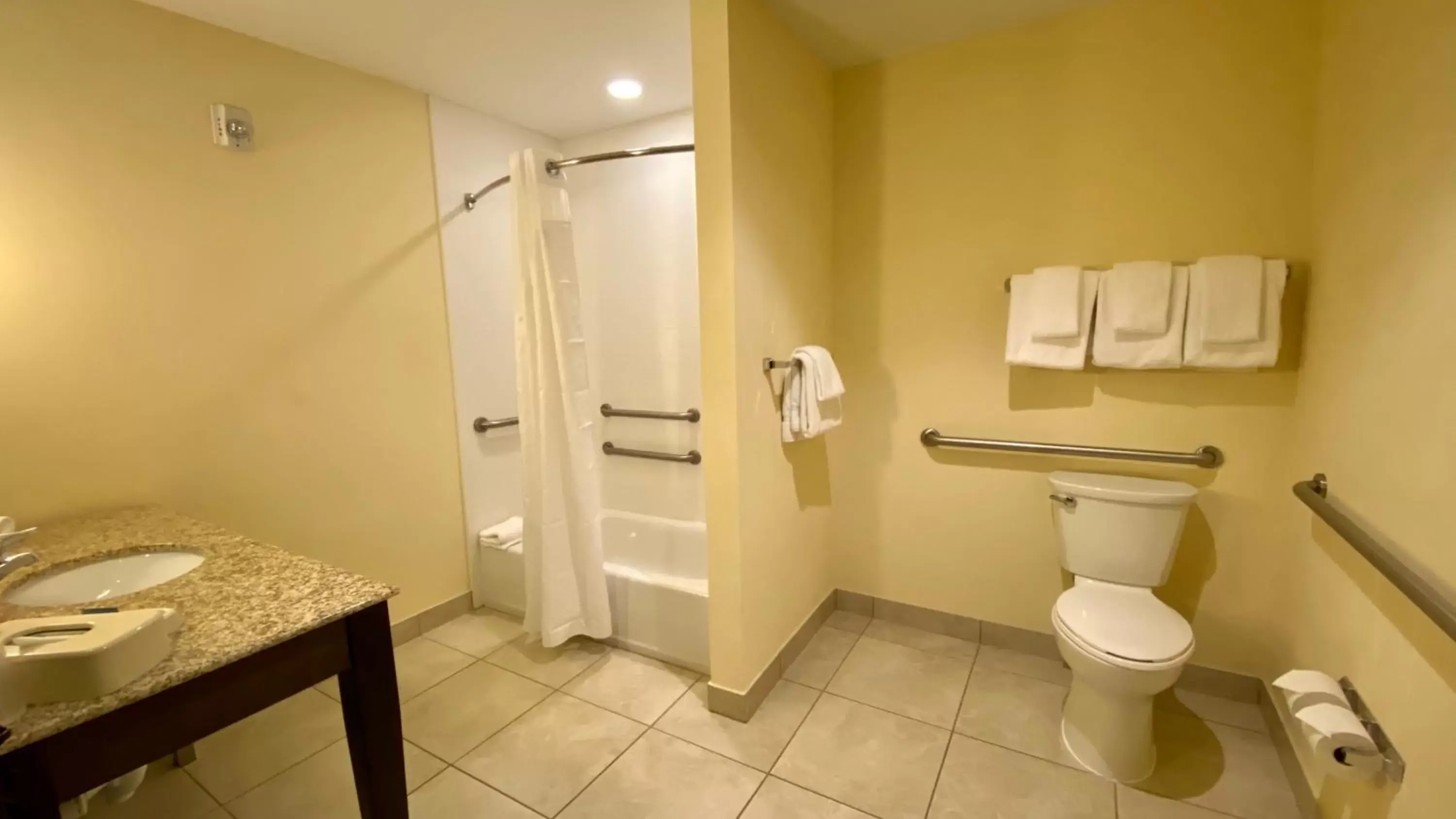Bathroom in Holiday Inn Express Hotel & Suites Orlando East-UCF Area, an IHG Hotel