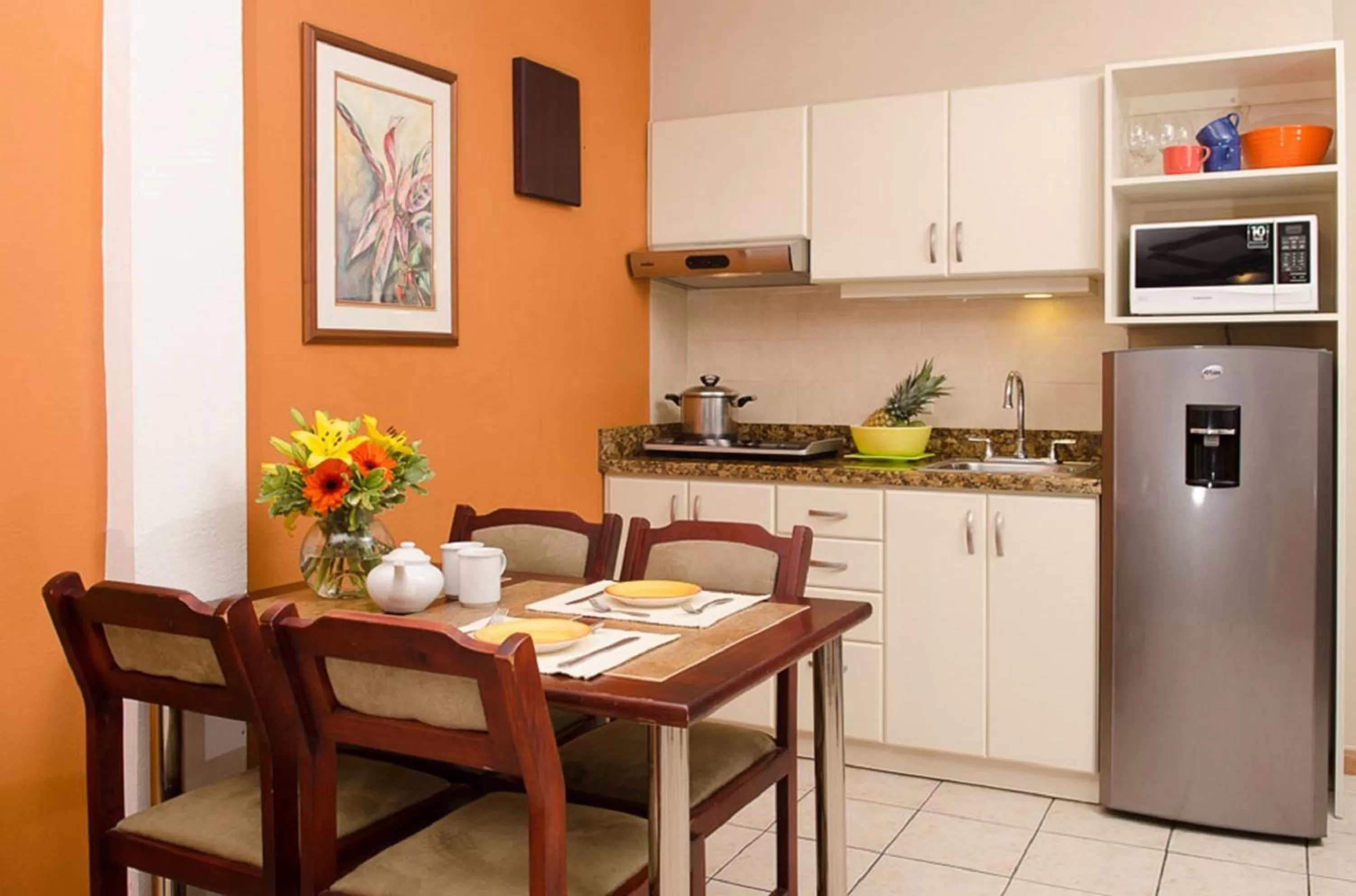 Kitchen or kitchenette in La Sabana Hotel Suites Apartments