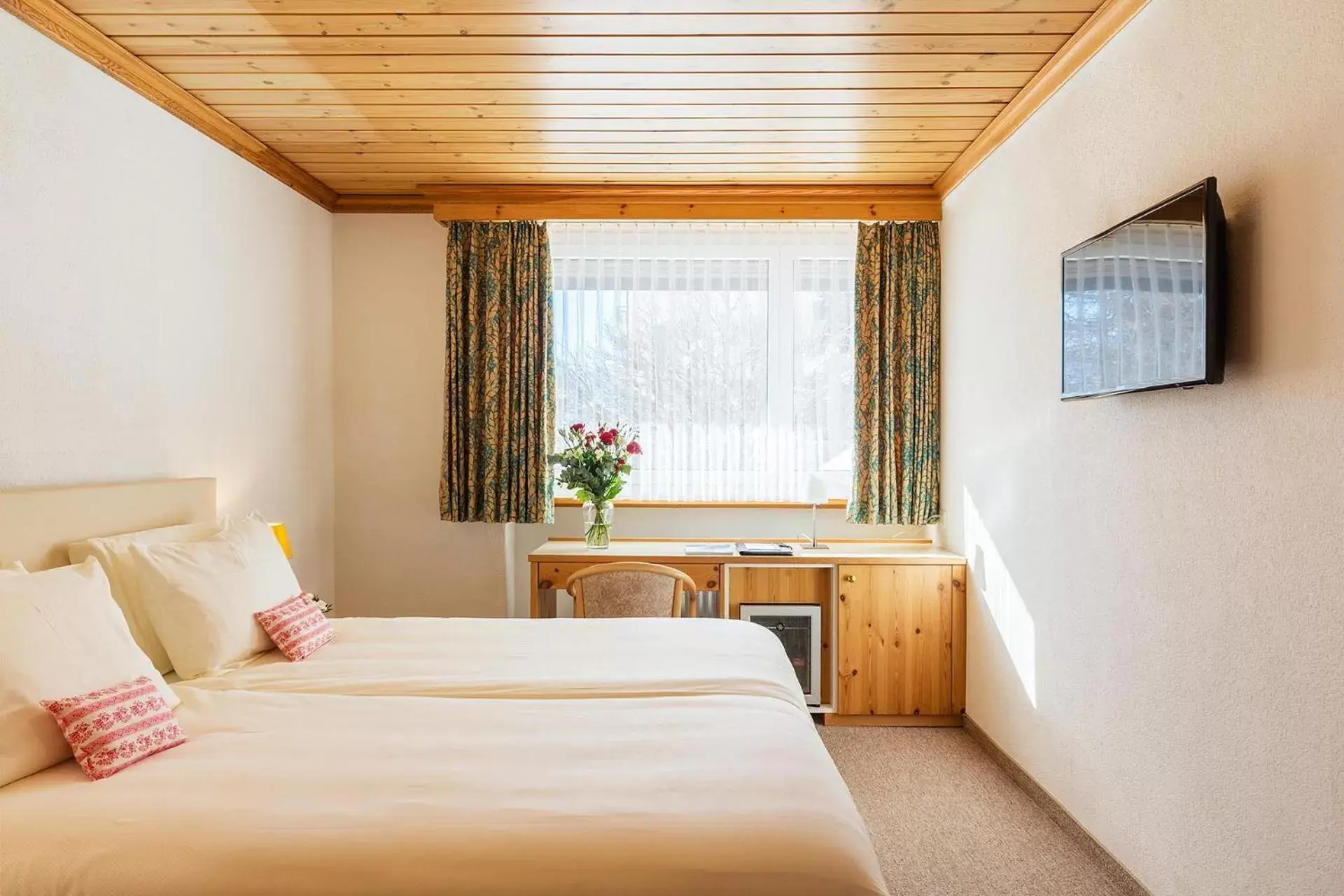 Bed in Hotel Europa St. Moritz