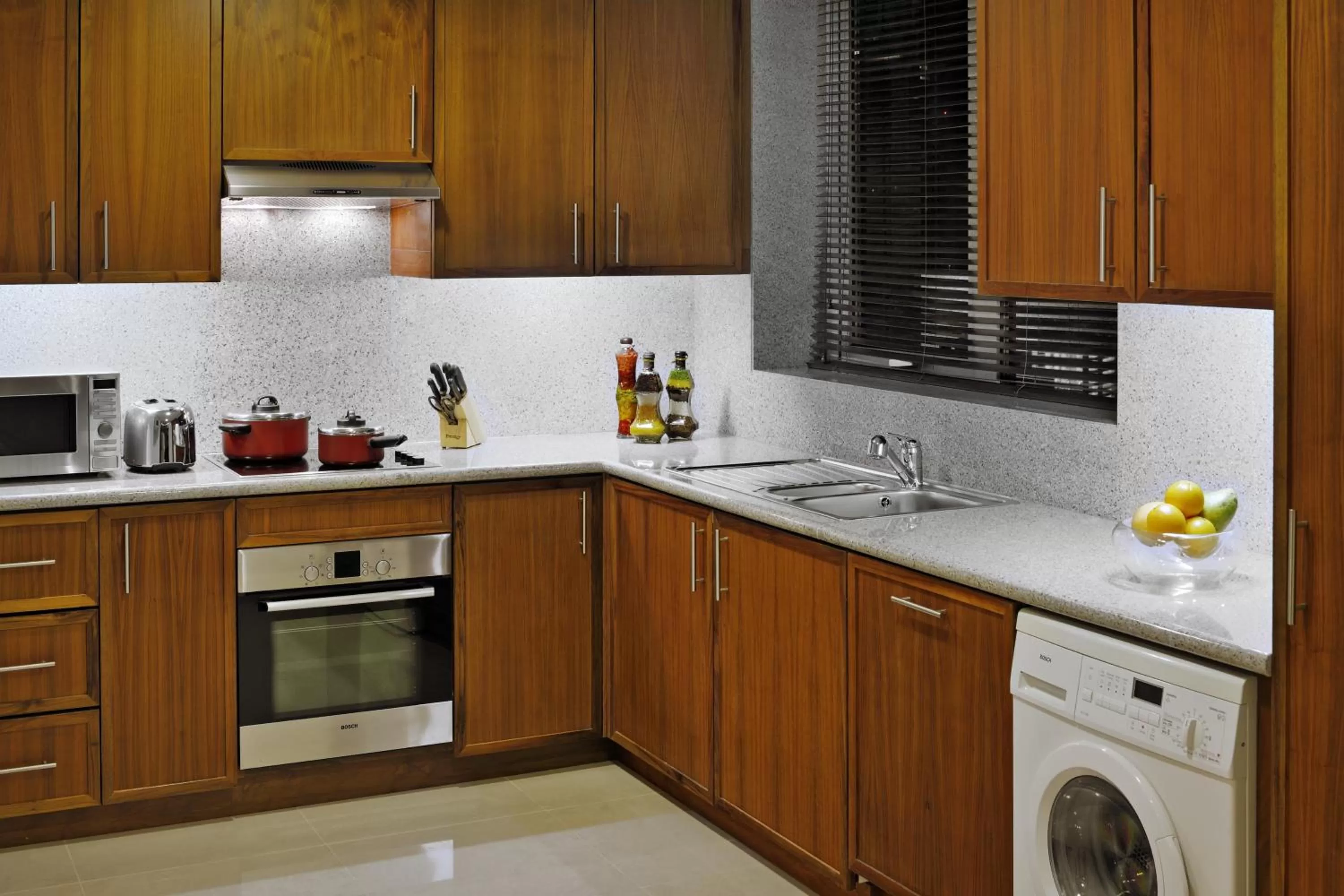 Kitchen or kitchenette in Ramada by Wyndham Downtown Dubai
