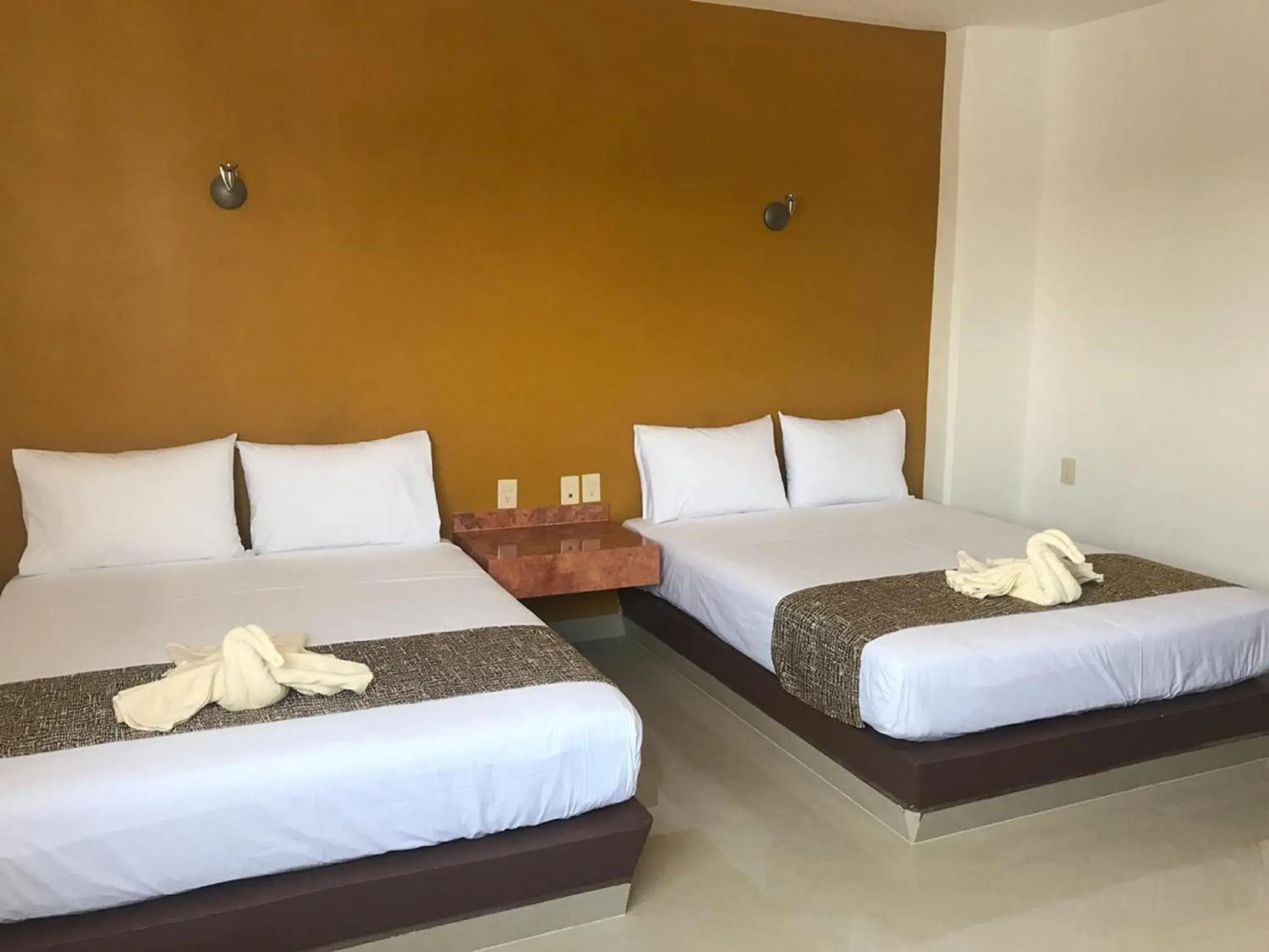 Bed in Hotel Maria del Rocio