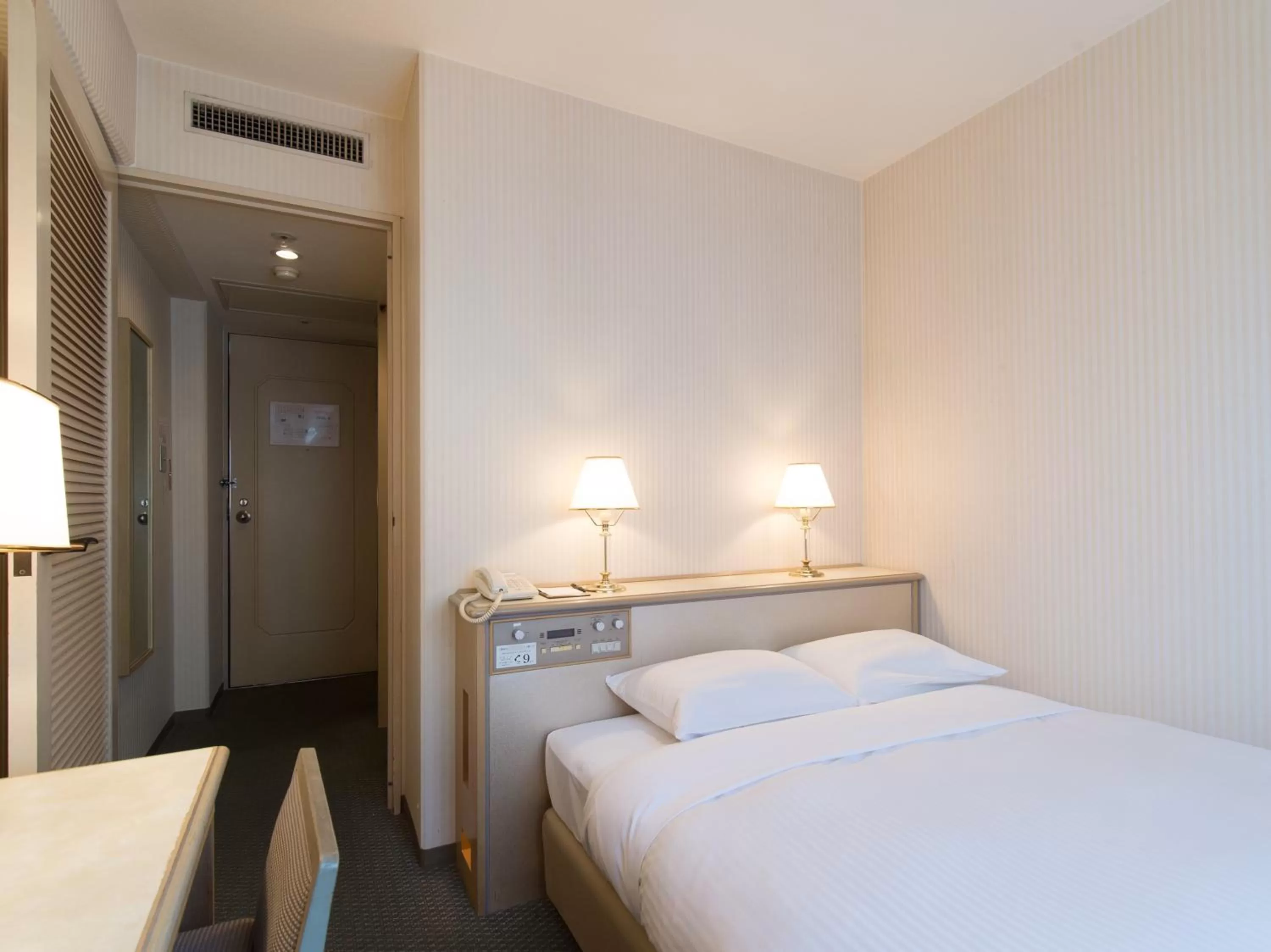 Photo of the whole room, Bed in Tabist Hotel Tetora Kitakyushu