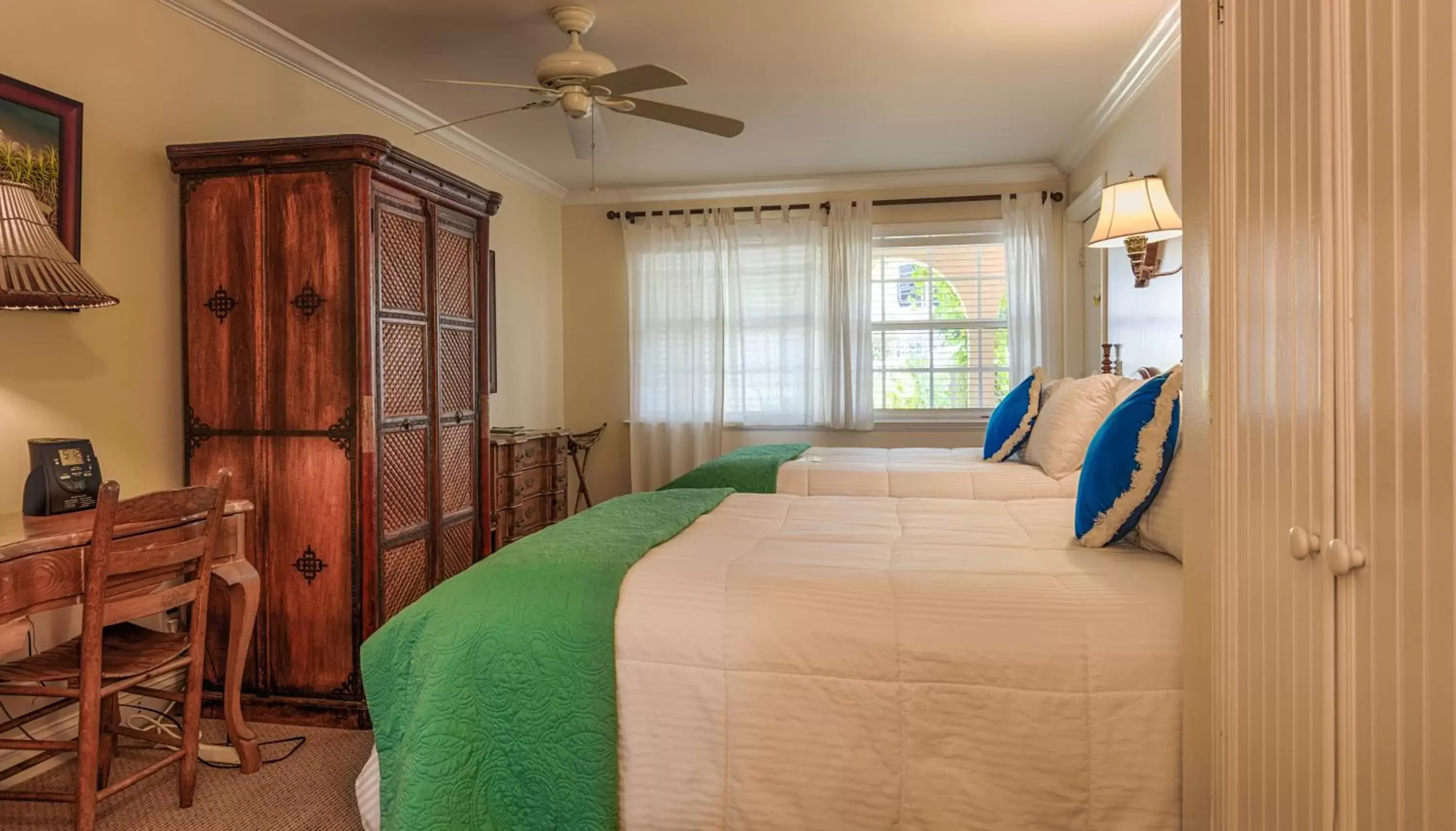 Bedroom, Room Photo in The Caribbean Court Boutique Hotel