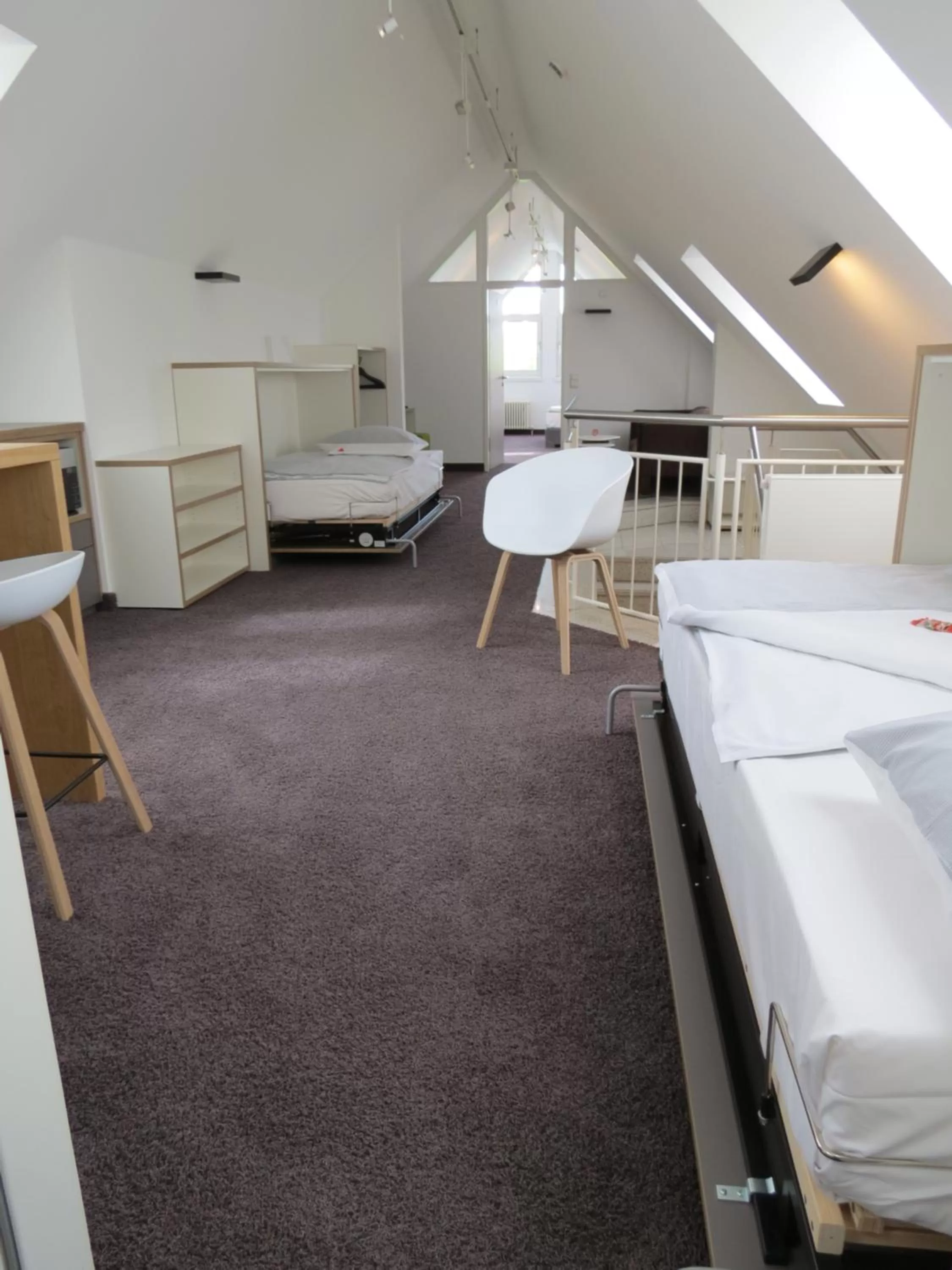 Seating area, Bed in Comfor Hotel Ulm City