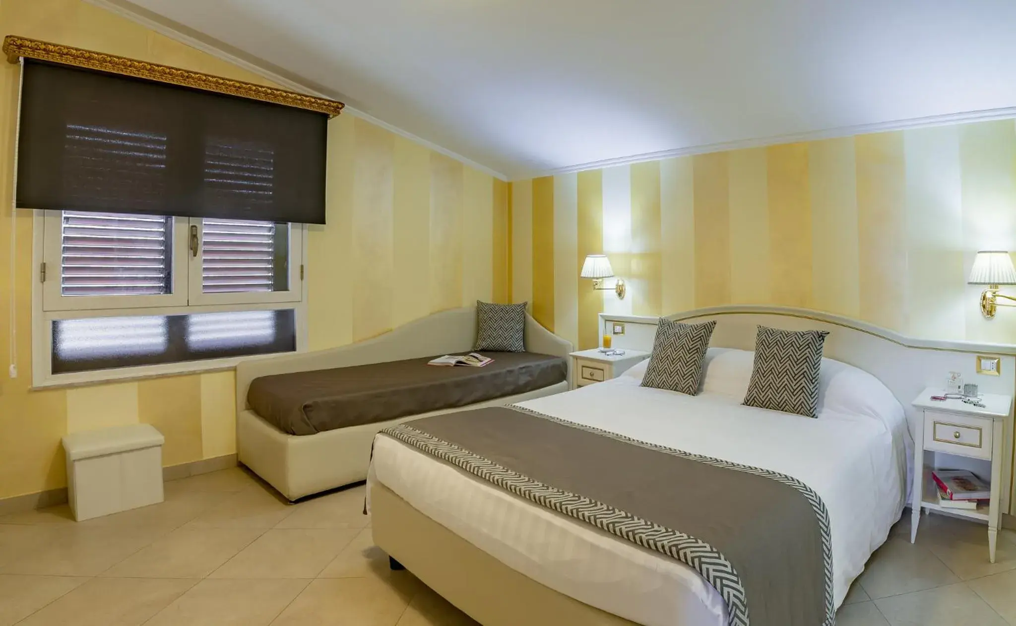 Bed in Vittorio Emanuele Boutique Hotel