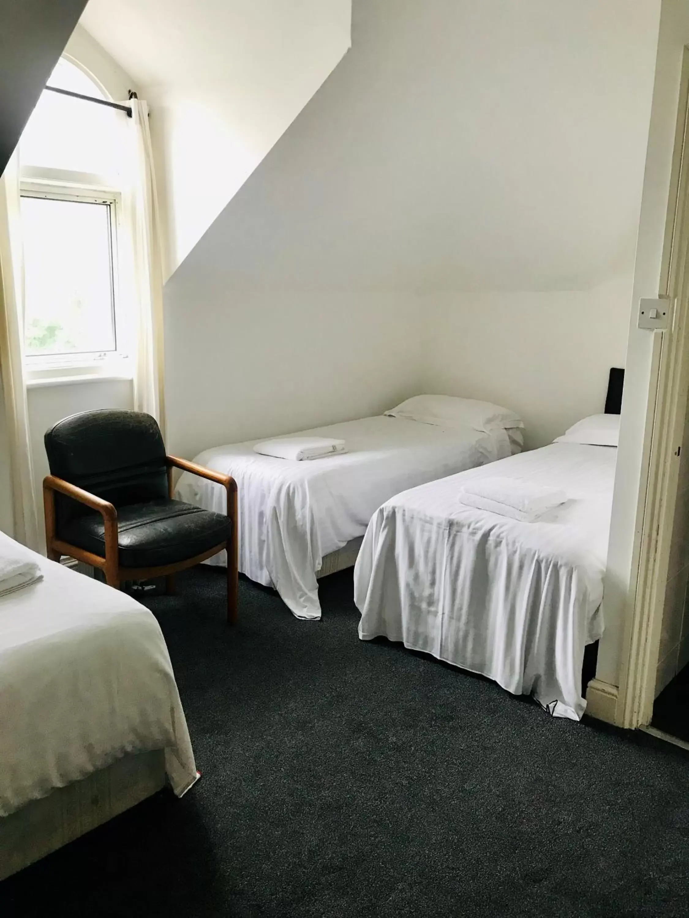 Bed in Amhurst Hotel