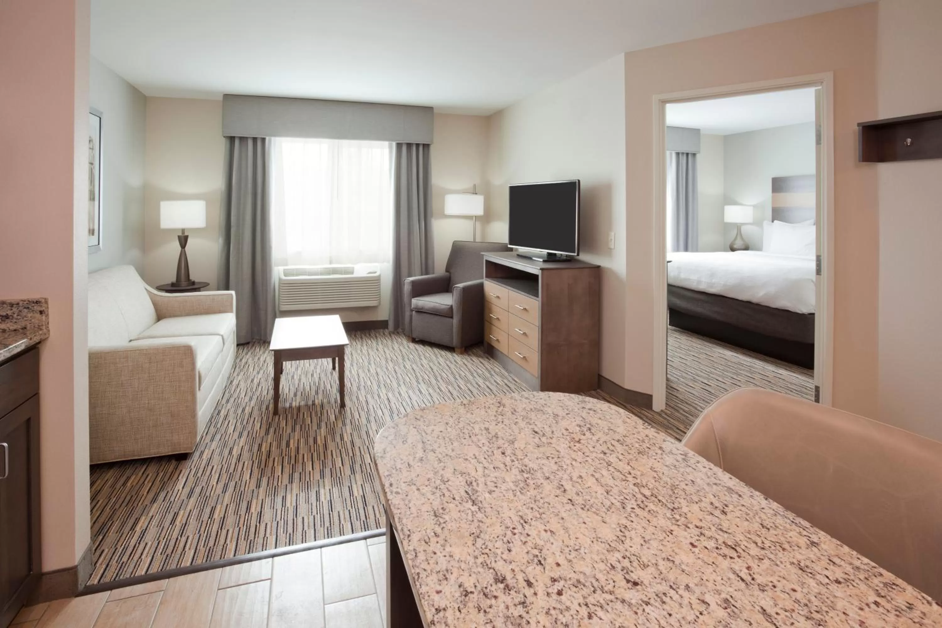 Photo of the whole room, Bed in GrandStay Hotel & Suites