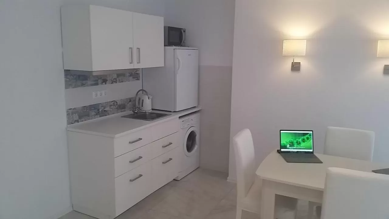 TV and multimedia, Kitchen/Kitchenette in PURE WELLNESS SEA-VIEW Beluga & Dolphin Luxury HOTEL apartments