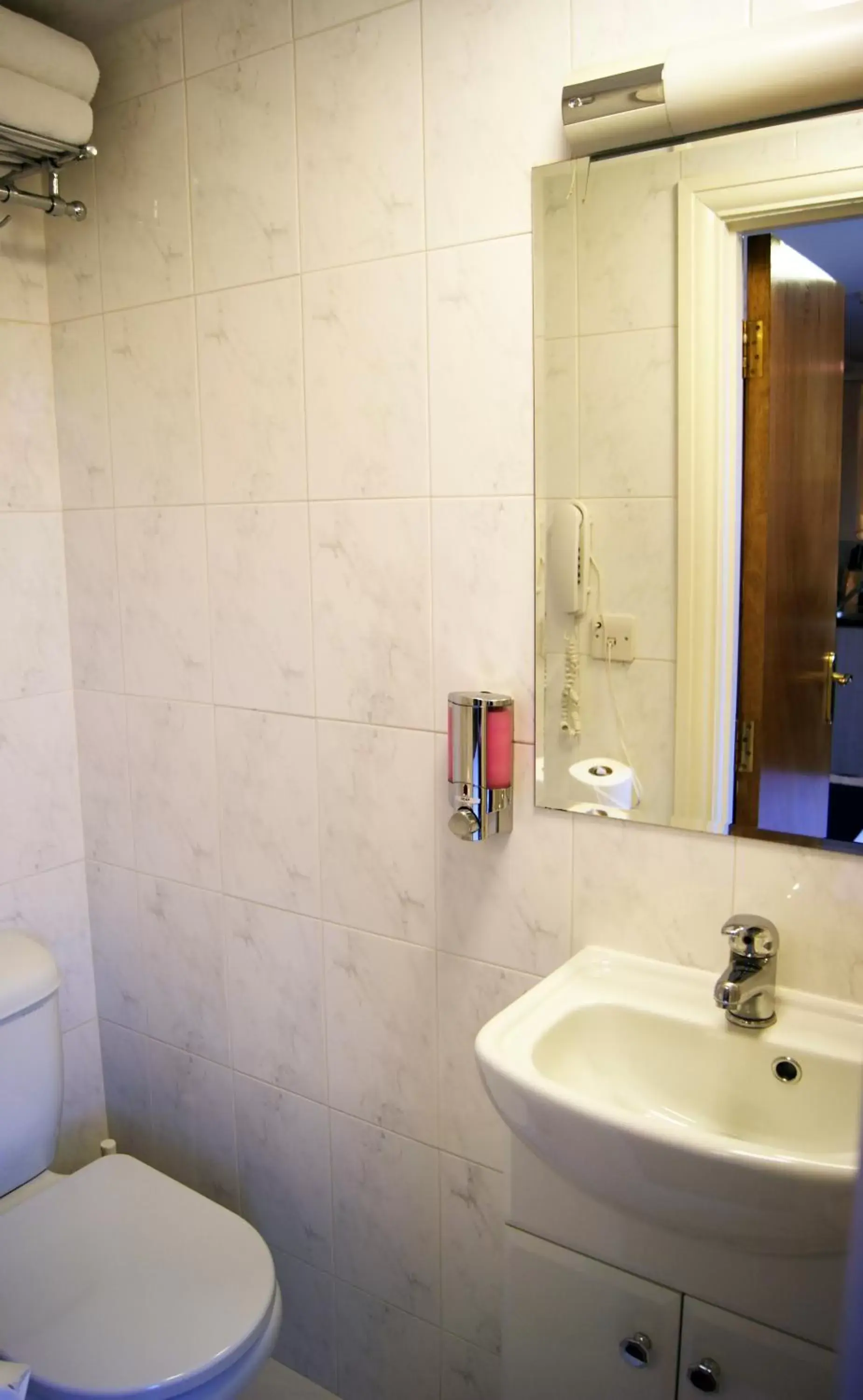 Toilet, Bathroom in Aspen Hotel