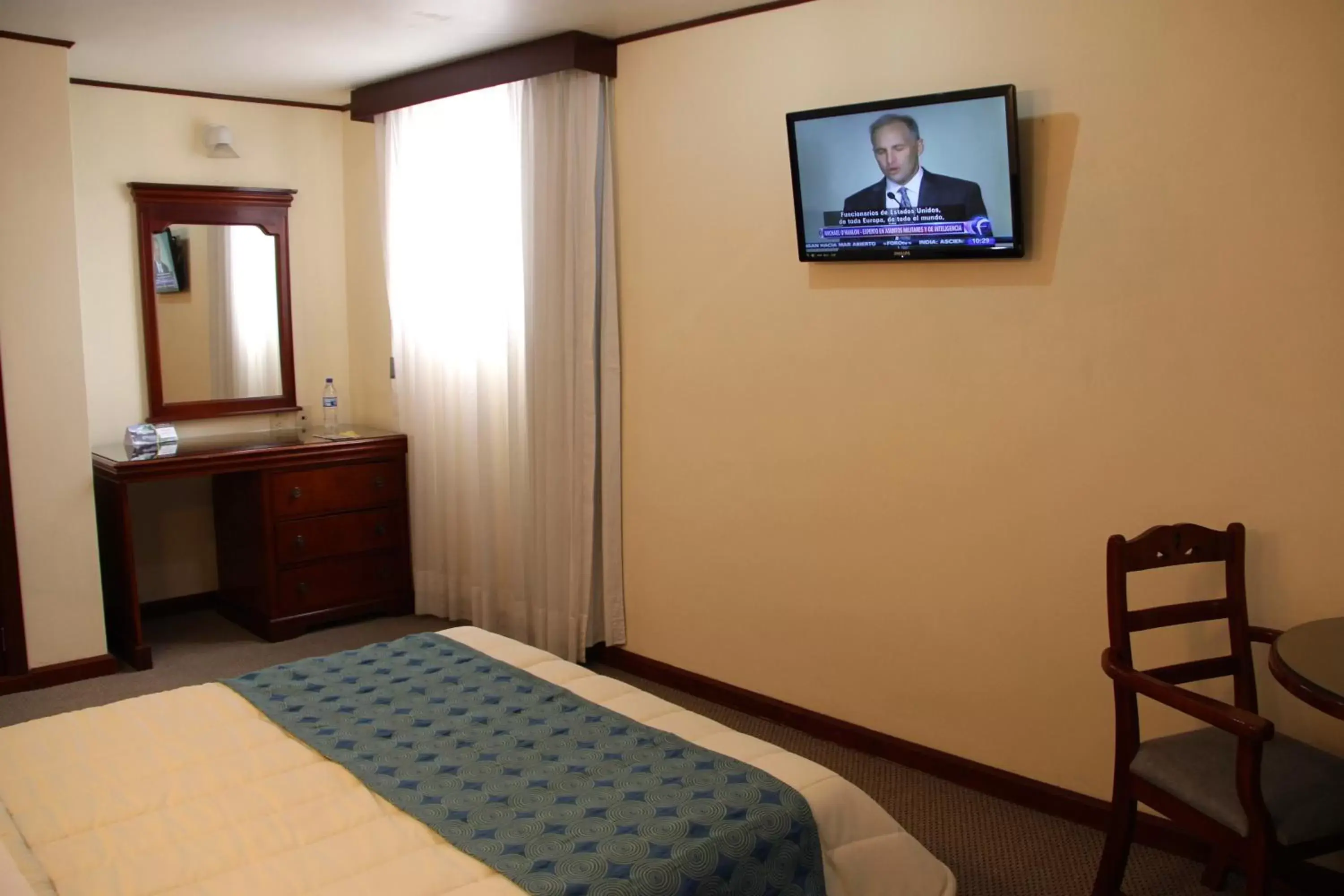 Bed, TV/Entertainment Center in Hotel Tehuacan Plaza