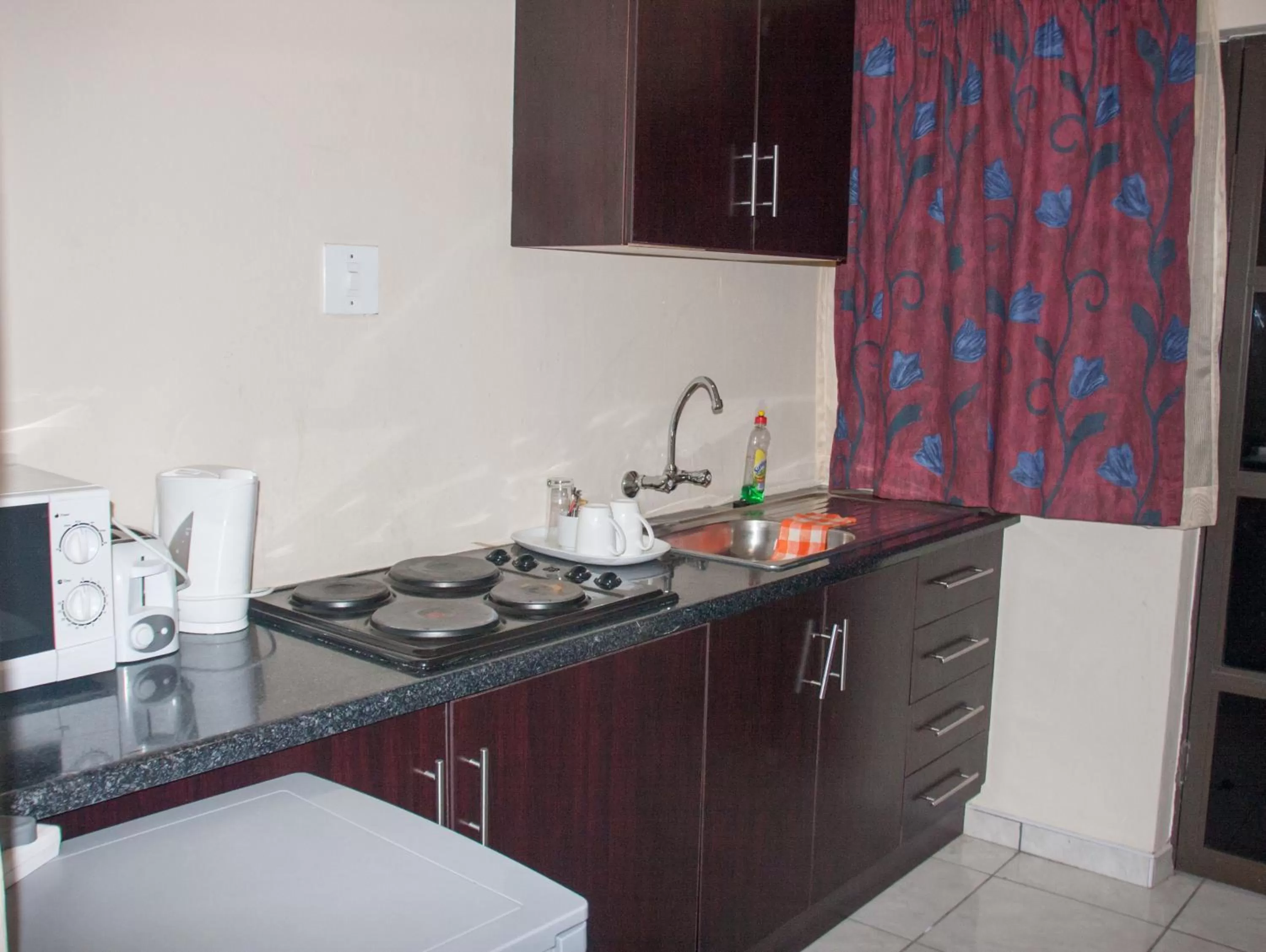 Kitchen or kitchenette in Tribute Guest House Matala