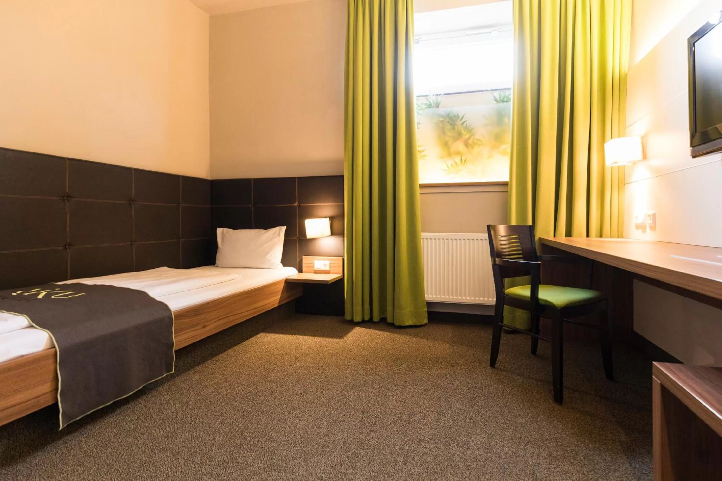 Photo of the whole room, Bed in RiKu HOTEL Neu-Ulm