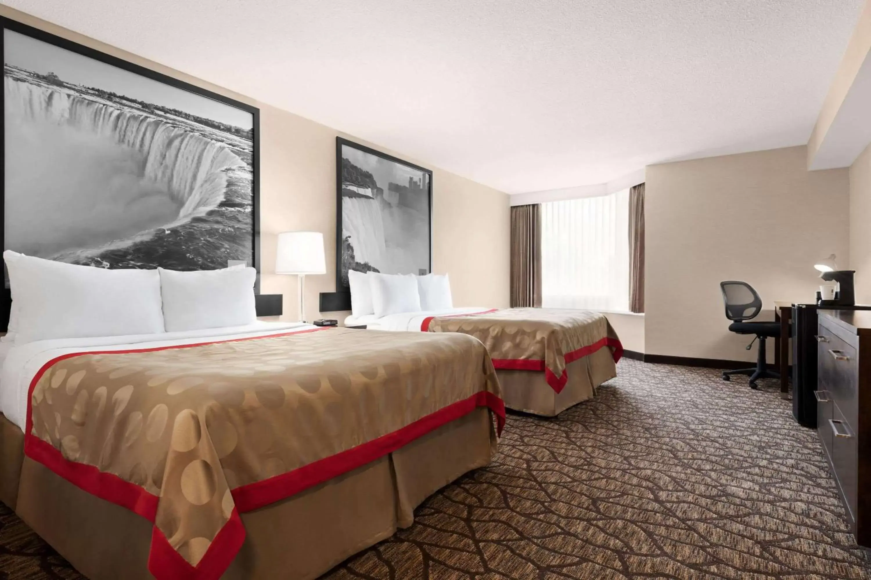 Photo of the whole room, Bed in Ramada By Wyndham Niagara Falls near the Falls