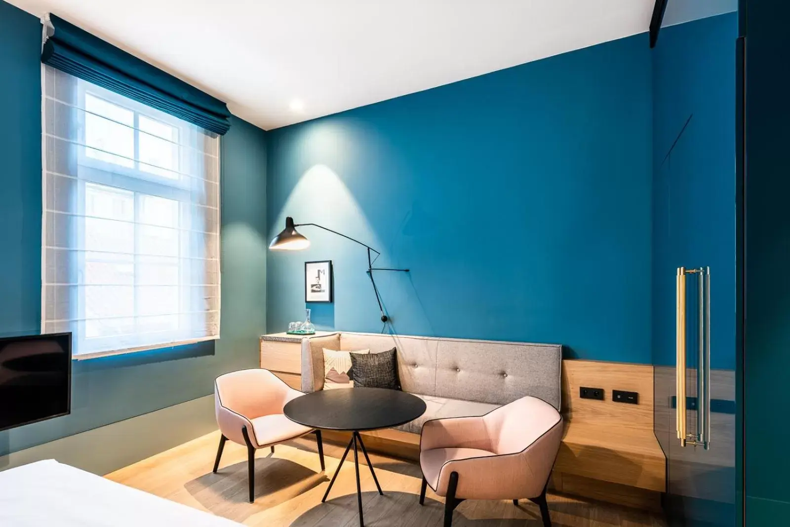 Seating area, Bed in Maximilian Hotel Seating area, Bed in Maximilian Hotel