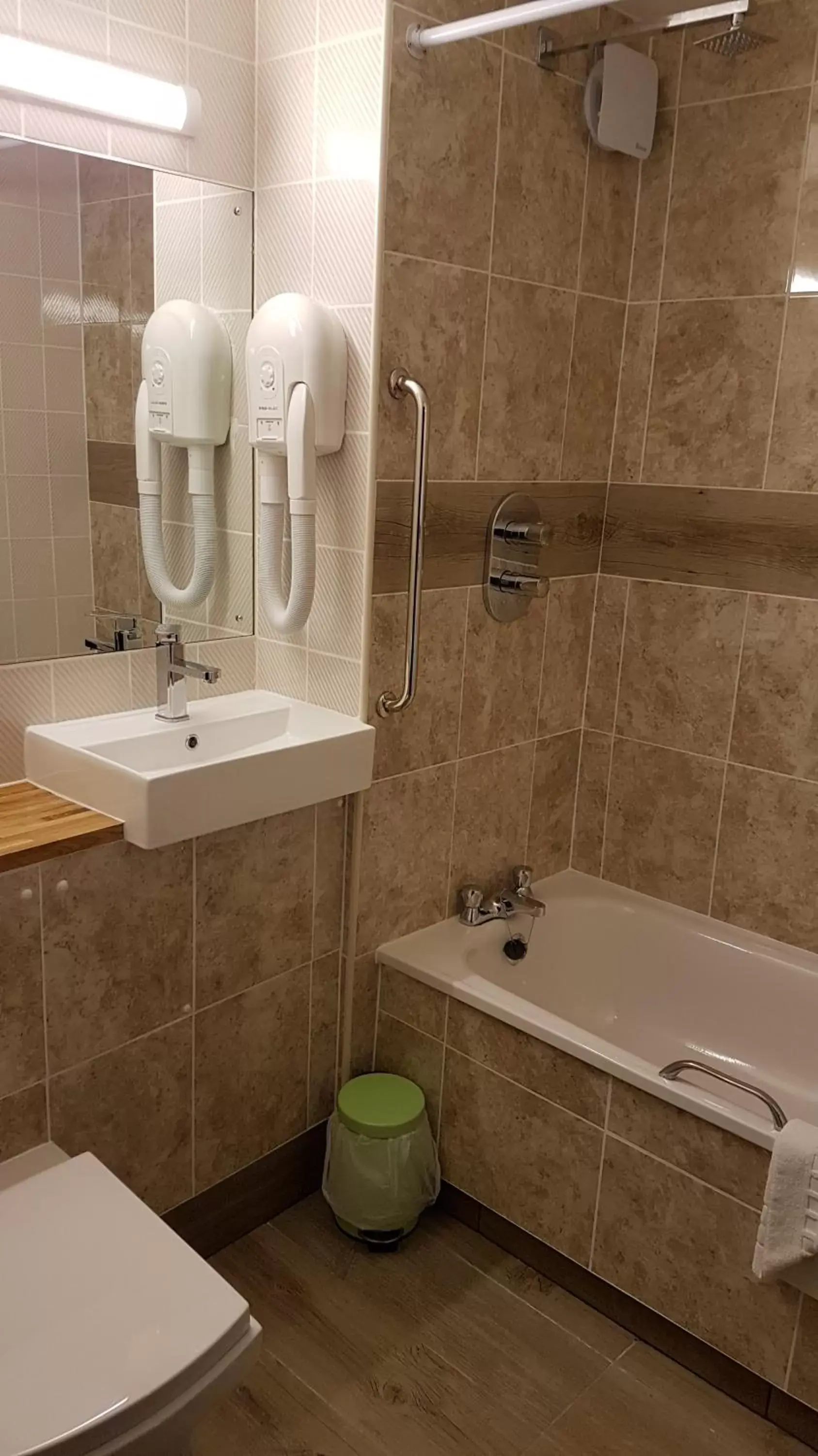 Bathroom in Travel Plaza Hotel