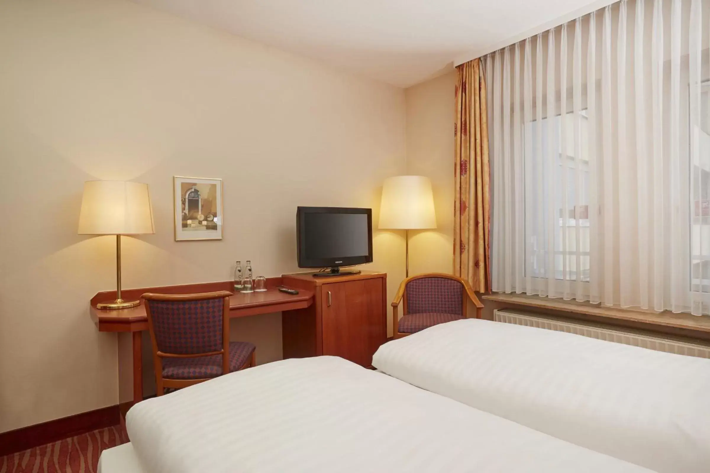 Photo of the whole room, Bed in Novum Hotel Mannheim City