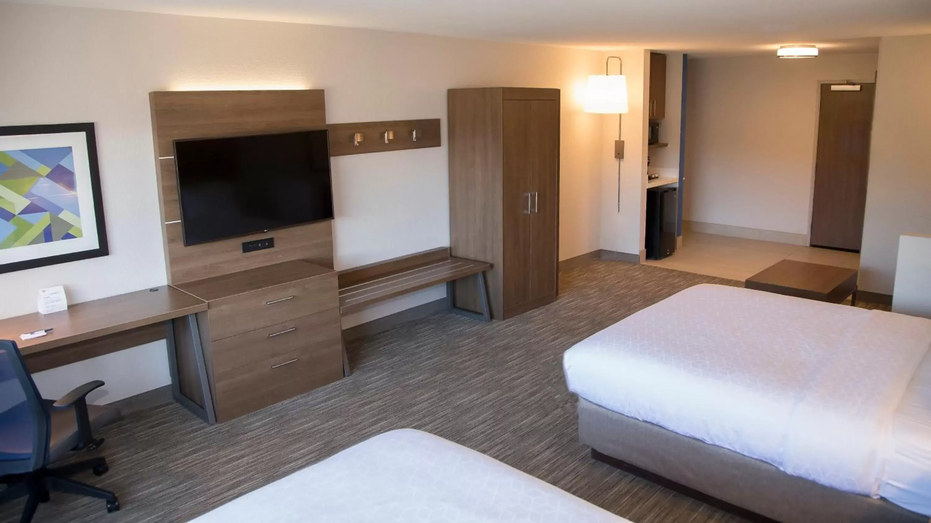 Photo of the whole room, TV/Entertainment Center in Holiday Inn Express & Suites Colorado Springs North, an IHG Hotel