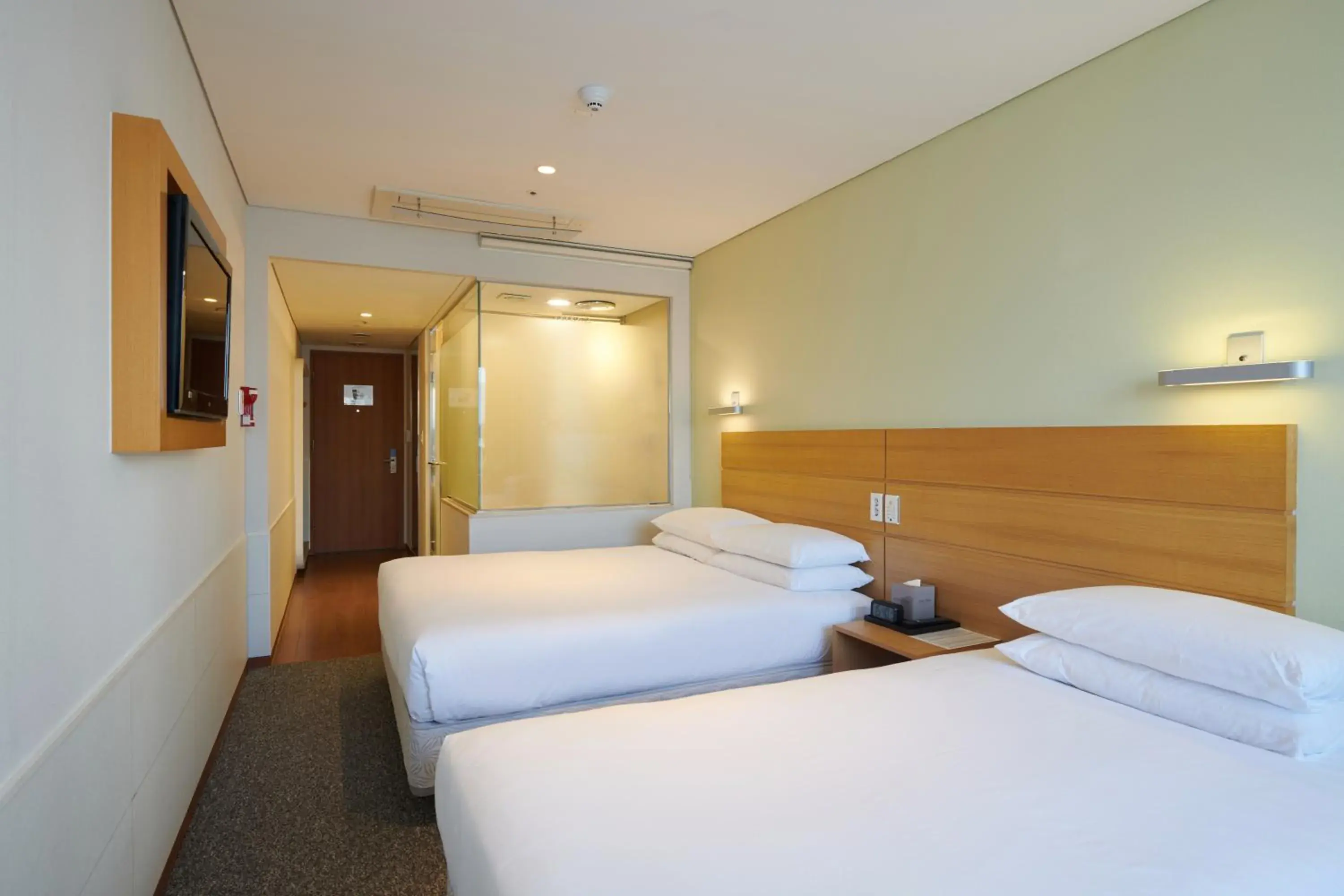 Bed in Nine Tree Hotel Myeongdong