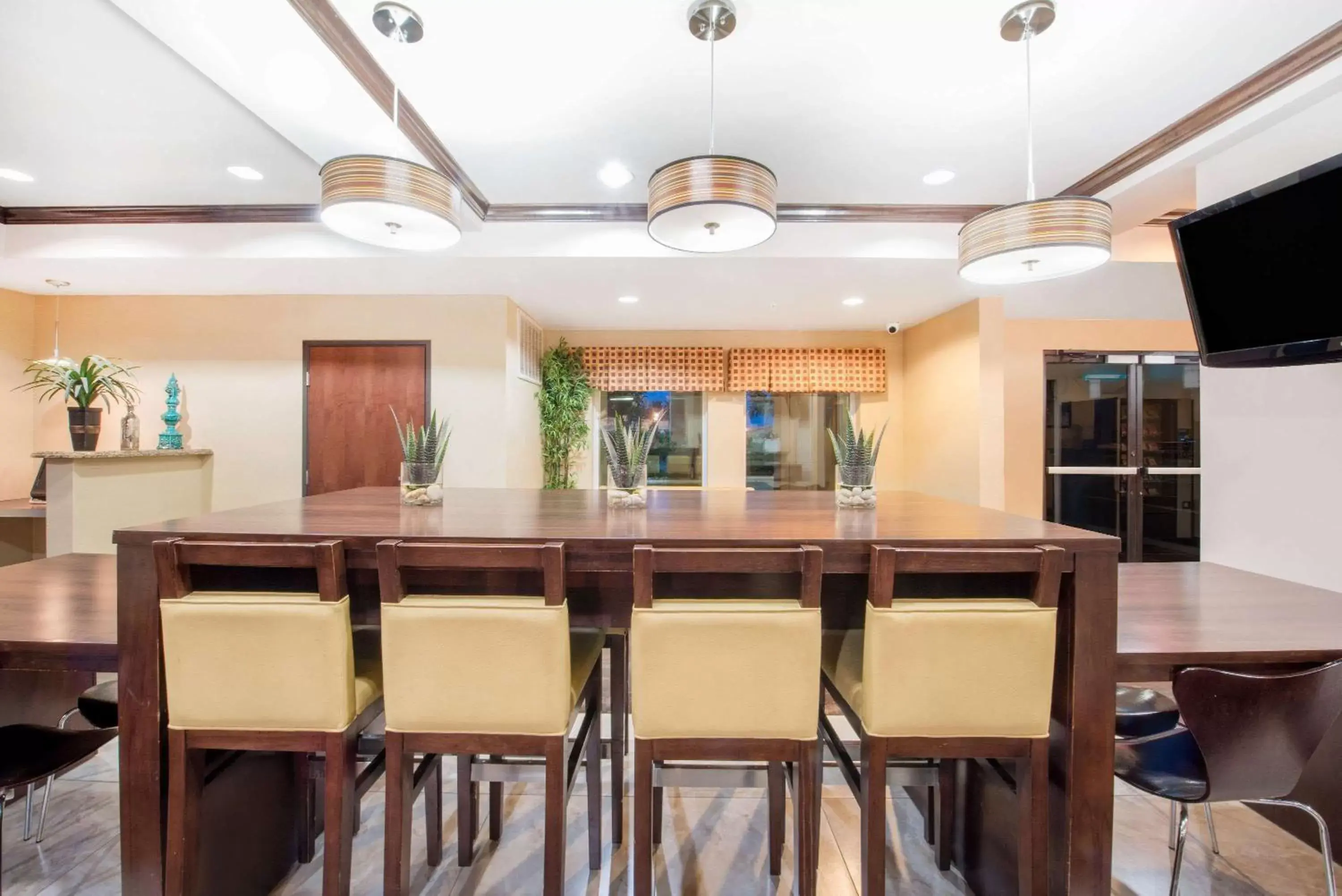 Lobby or reception in Super 8 by Wyndham Dilley TX Lobby or reception in Super 8 by Wyndham Dilley TX