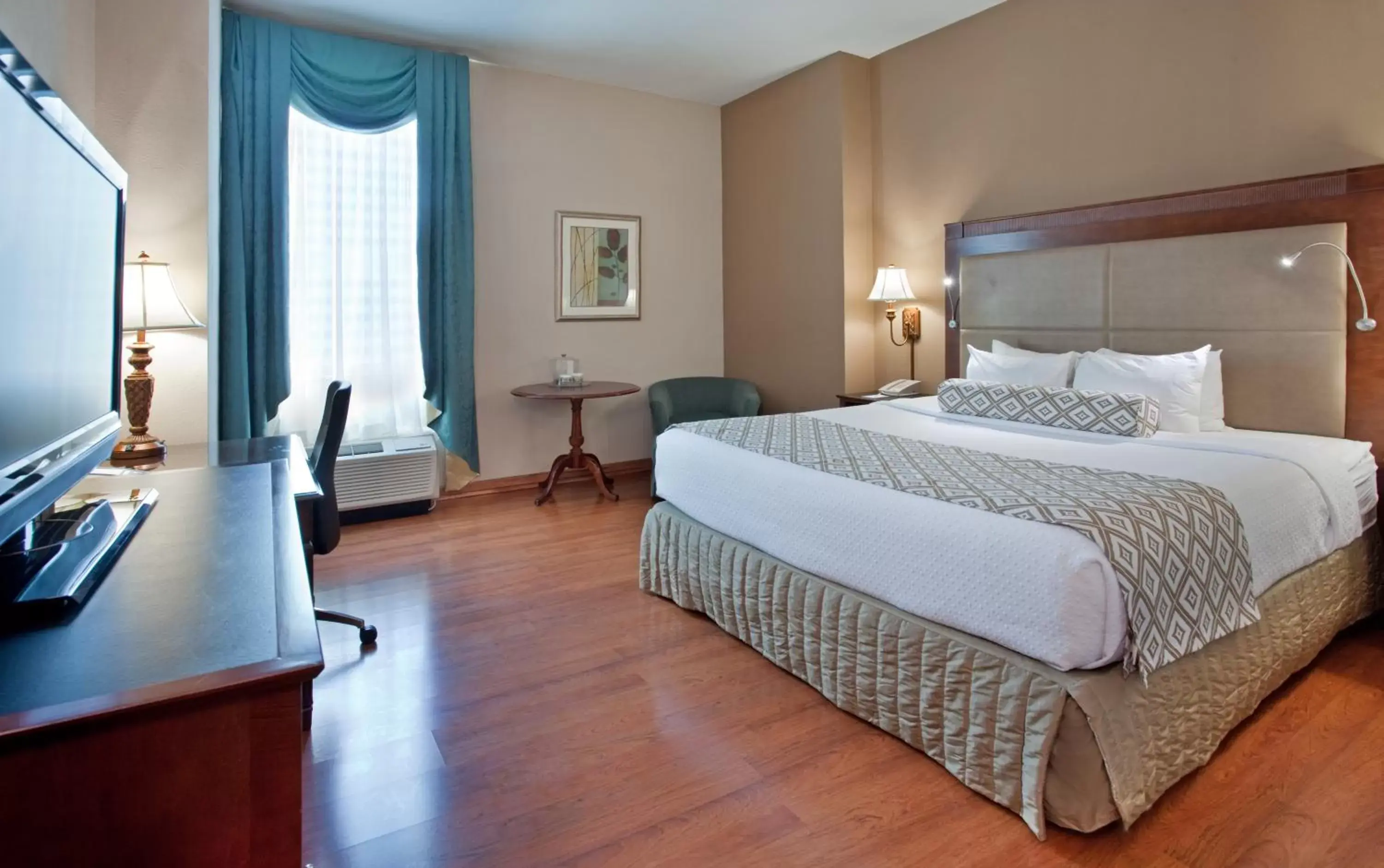 Bed in Clayton Plaza Hotel & Extended Stay