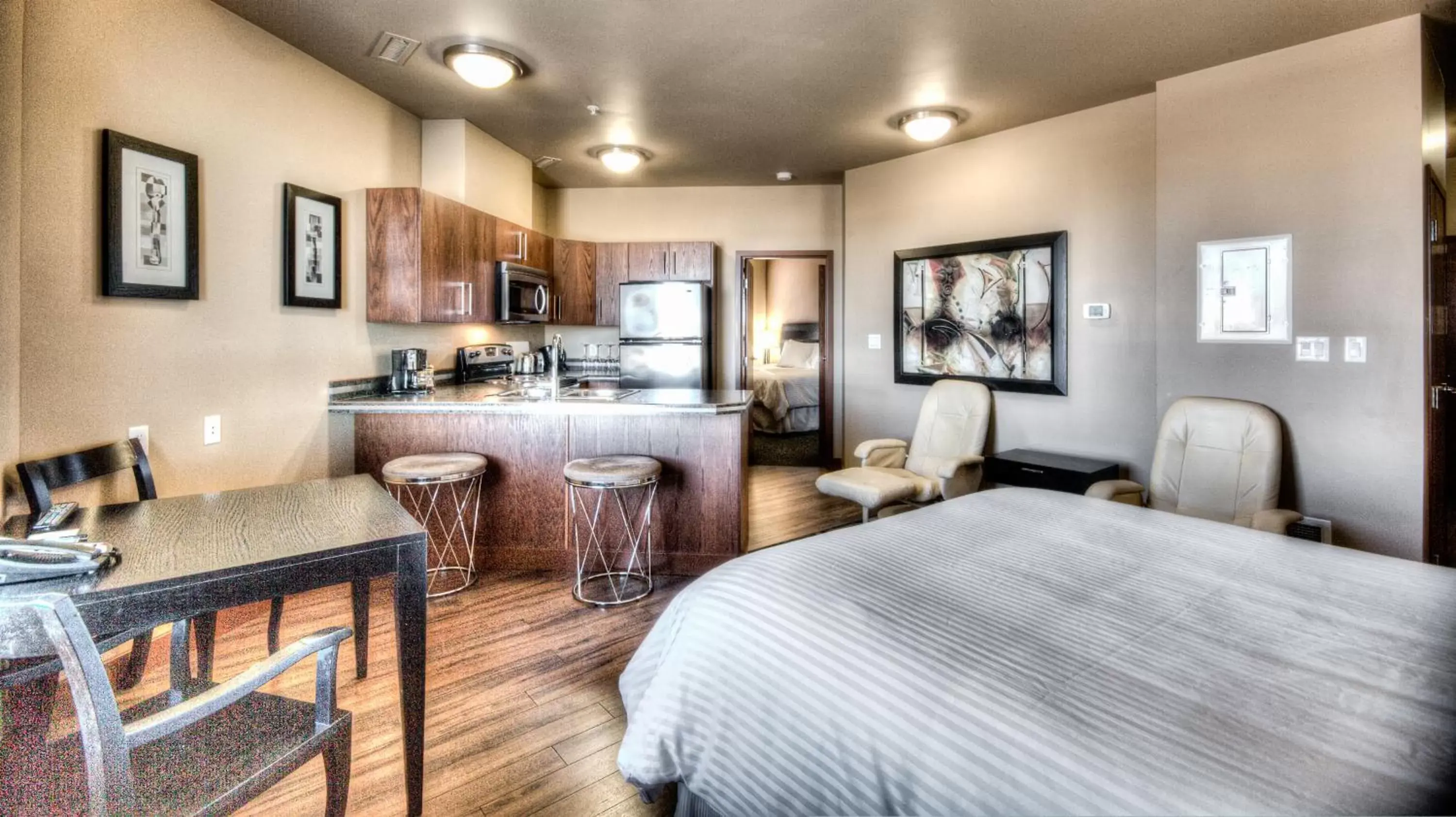 Bedroom in Grand Inn & Residence- Grande Prairie